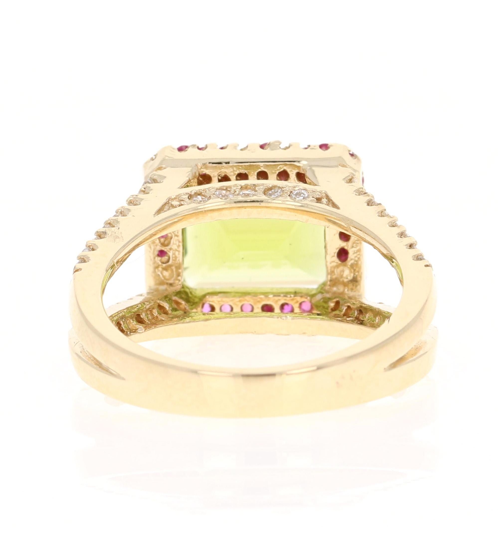 Contemporary 4.56 Carat Emerald Cut Peridot Sapphire and Diamond 14 Karat Yellow Gold Ring