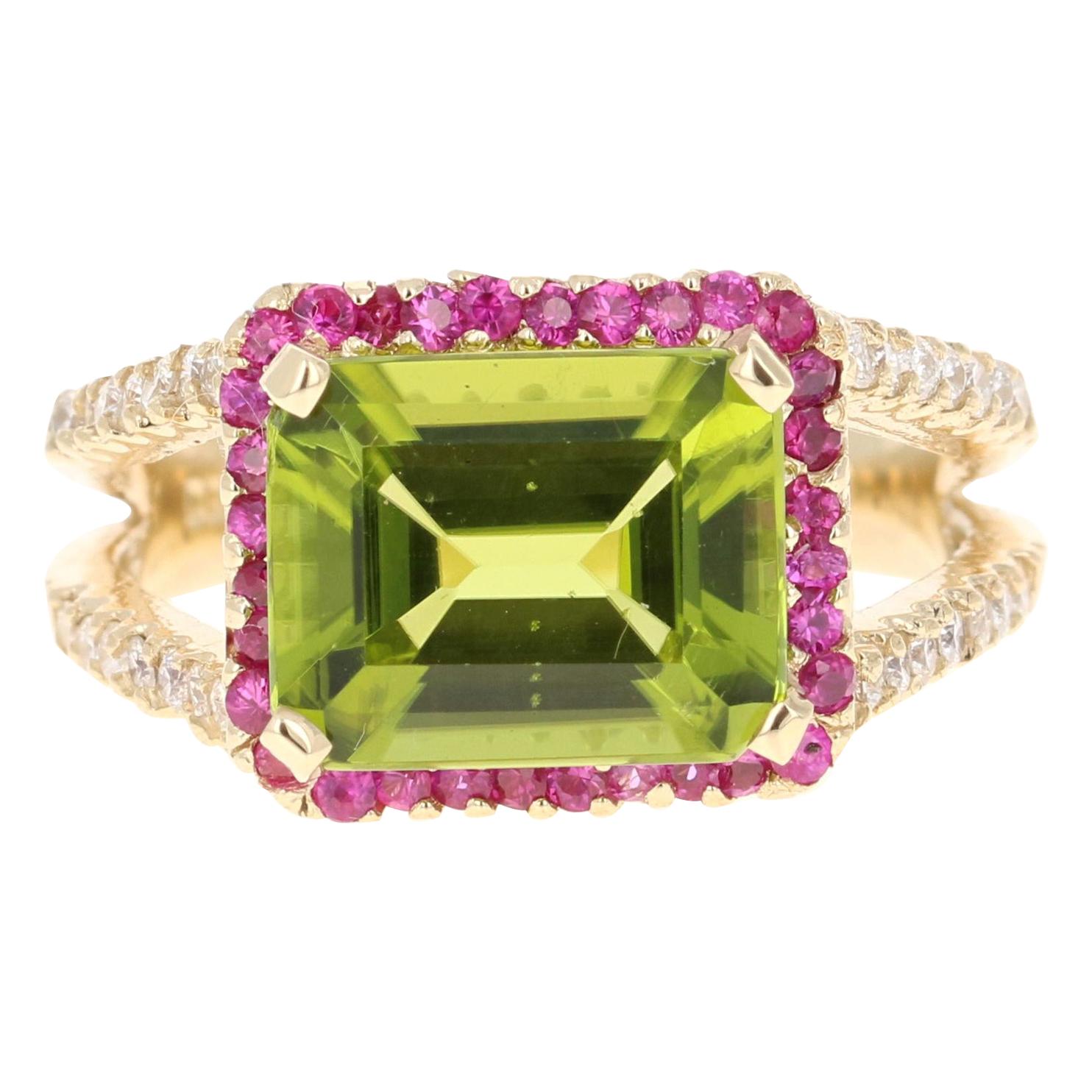 4.56 Carat Emerald Cut Peridot Sapphire and Diamond 14 Karat Yellow Gold Ring