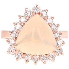 Bague de fiançailles en or rose avec opale de 4,56 carats et diamants