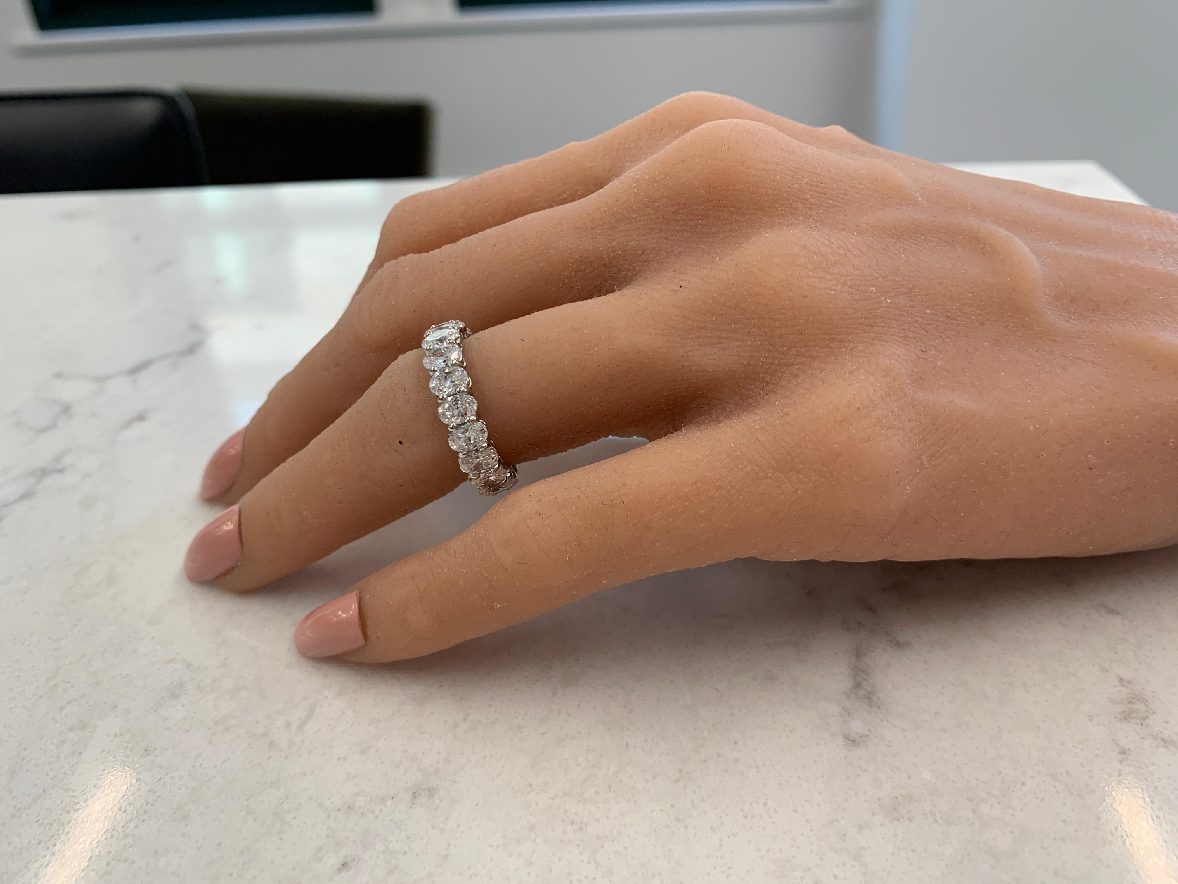Diamond eternity bands are perfect for stacking with other fine rings or worn as a classic style wedding band, displaying spectacular fire and brilliance in a never-ending row. This gorgeous 18k white gold eternity band features a total of 19 oval