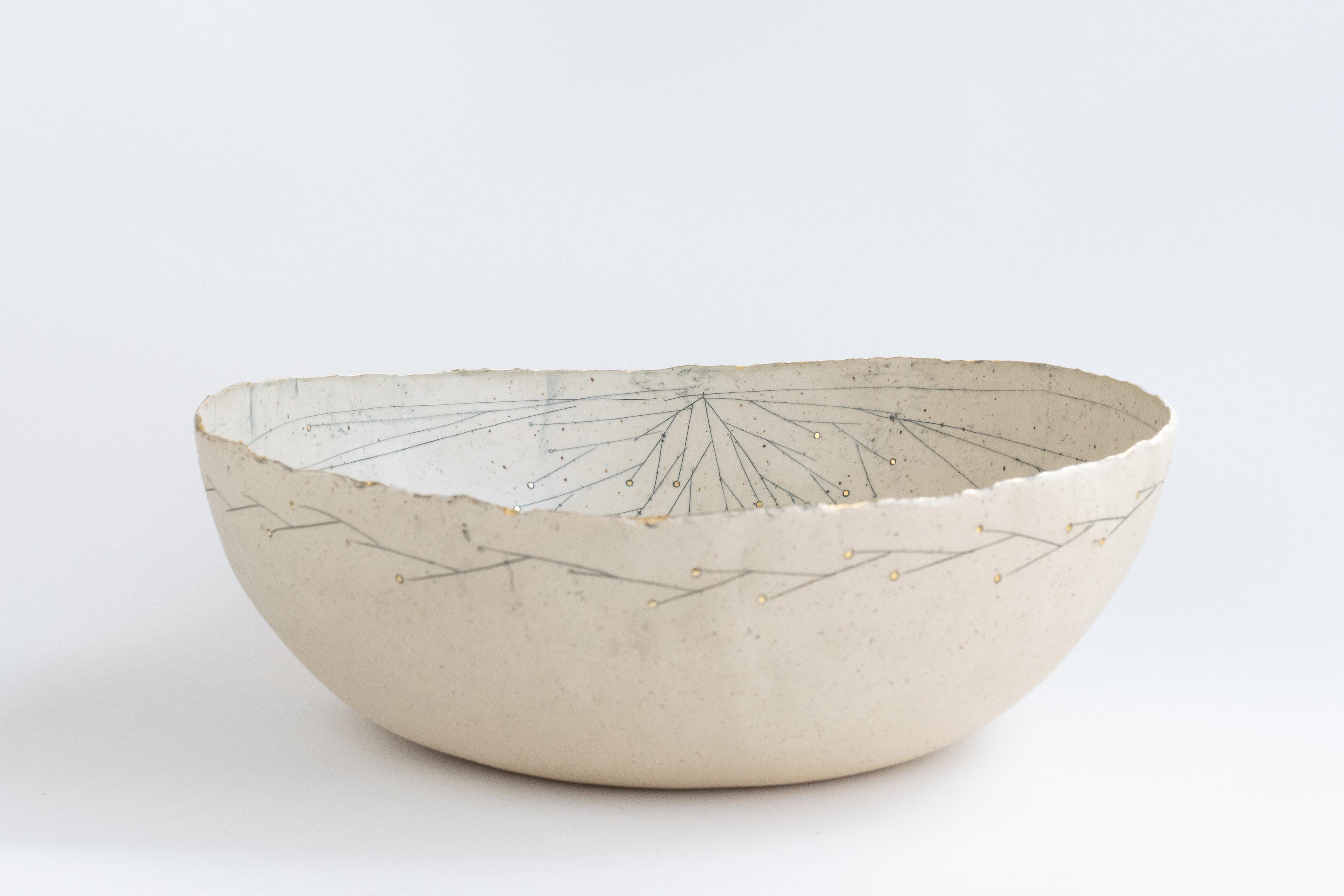 Hand Built Golden Promise Stoneware big bowl With 22kt gold detail by Helen Prior

A delicate hand-crafted bowl, organic in shape with a torn clay edge in natural speckled stoneware clay.
Part of the Golden Promise Series- a theme of abstracted and