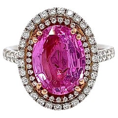 Bague pour femme à double halo de saphirs roses ovales et diamants sertis en pavé de 4,56 carats au total, certifiée GIA