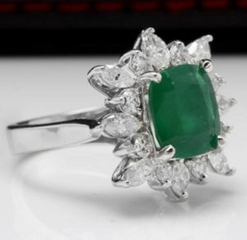 4.06 Carats Natural Emerald and Diamond 14K Solid White Gold Ring

Total Natural Green Emerald Weight is: 2.56 Carats (transparent)

Emerald Measures: 9.11 x 7.66 mm

Natural Round & Marquise Diamonds Weight: 1.50 Carats (color G-H / Clarity