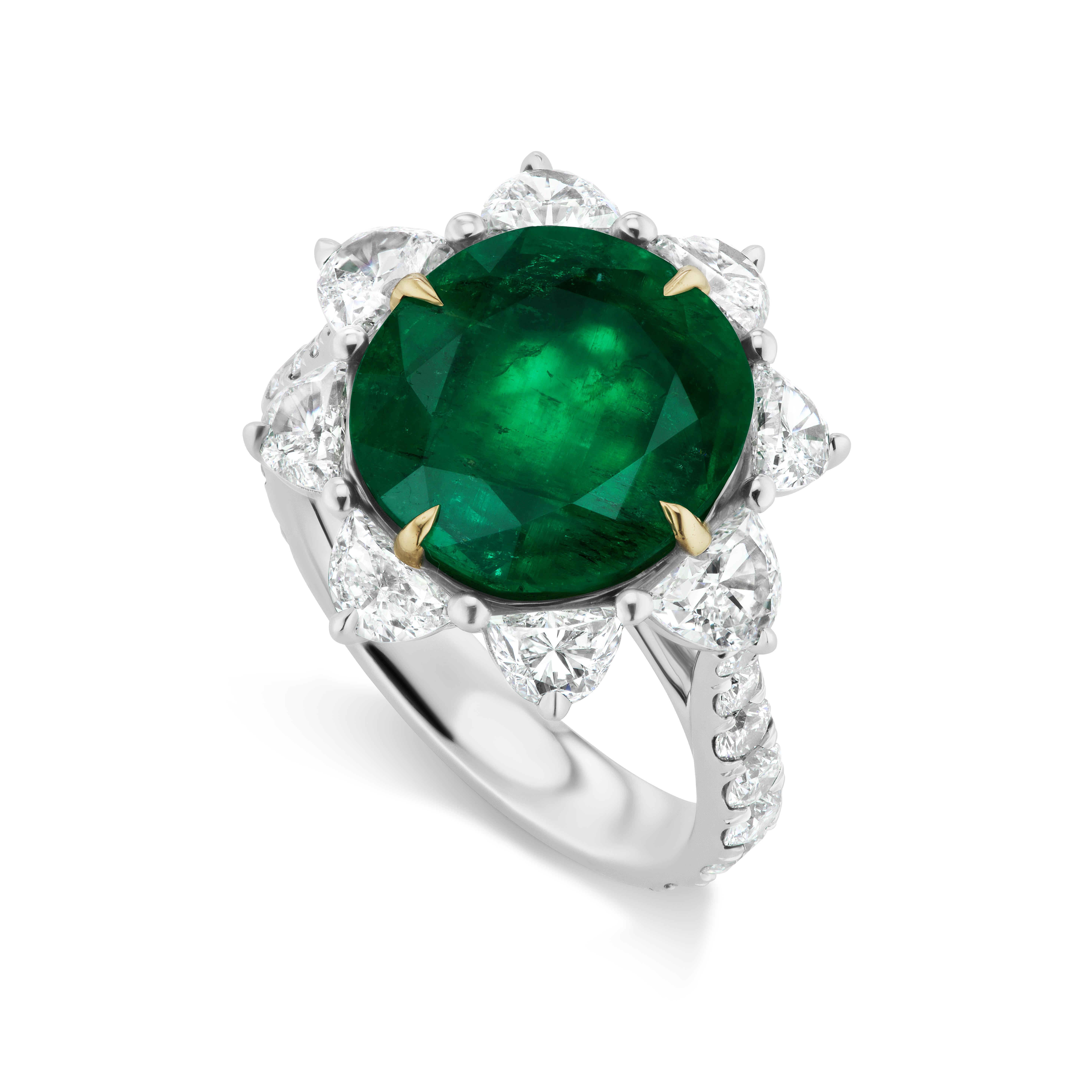 emerald surrounded by diamonds ring