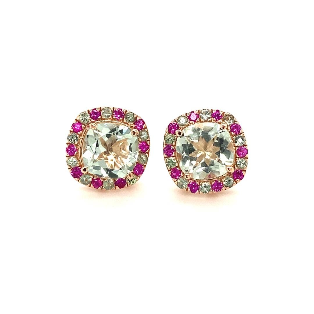 4.57 Carat Green Amethyst Sapphire Rose Gold Stud Earrings

These earrings have Cushion Cut Green Amethysts in the center that weigh 3.69 carats and are surrounded by Pink and Green Sapphires that weigh 0.88 carats. The total carat weight is 4.57