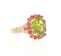 4.57 Carat Oval Cut Peridot Sapphire Diamond 14 Karat Yellow Gold Ring