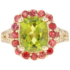 Bague en or jaune 14 carats avec péridot, saphir et diamant taille ovale de 4,57 carats