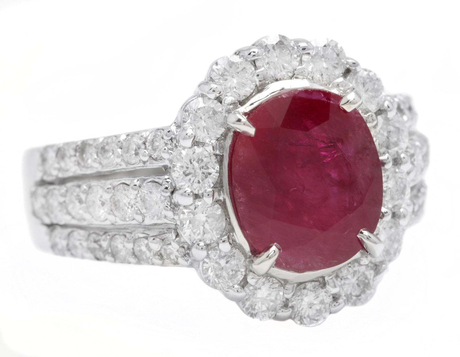 4.57 Carats Impressive Natural Red Ruby and Diamond 14K White Gold Ring

Suggested Replacement Value $8,000.00

Total Natural Red Ruby Weight is: Approx. 3.15 Carats 

Ruby Measures: Approx. 9.28 X 7.96mm 

Natural Round Diamonds Weight: Approx.