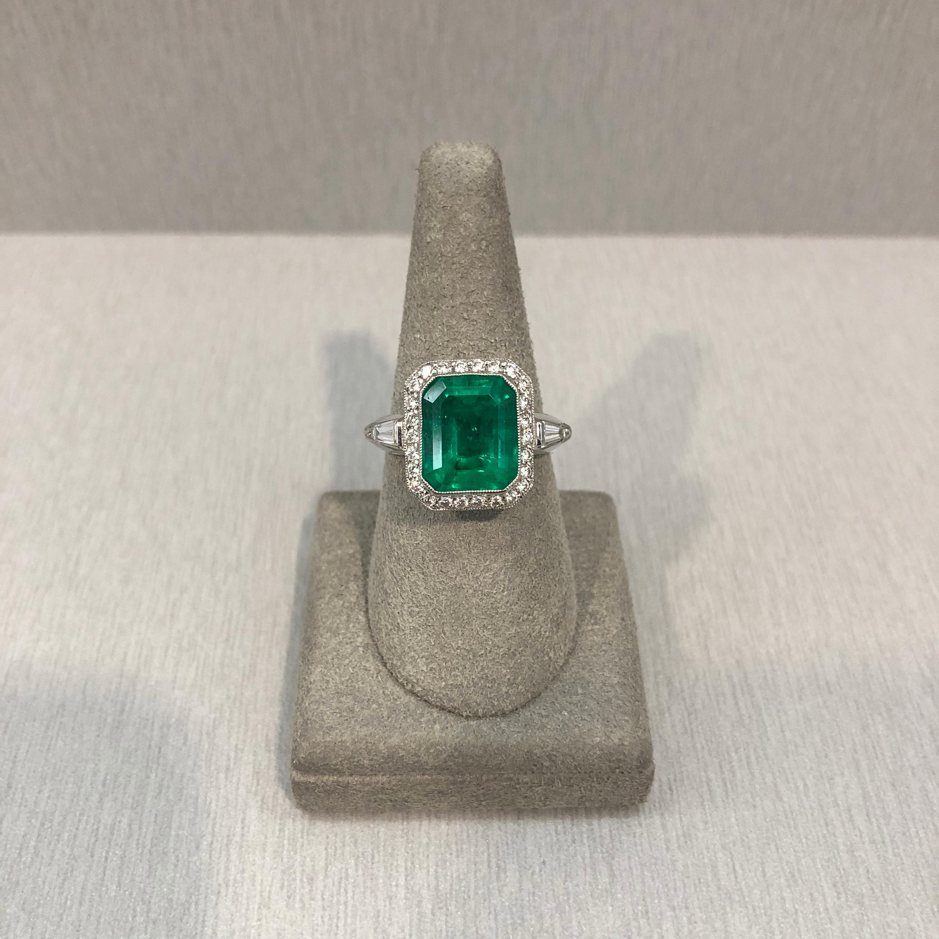 Modern Roman Malakov 4.58 Emerald Cut Green Emerald and Diamond Halo Engagement Ring For Sale