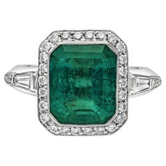 4.58 Carat Green Emerald and Diamond Halo Ring