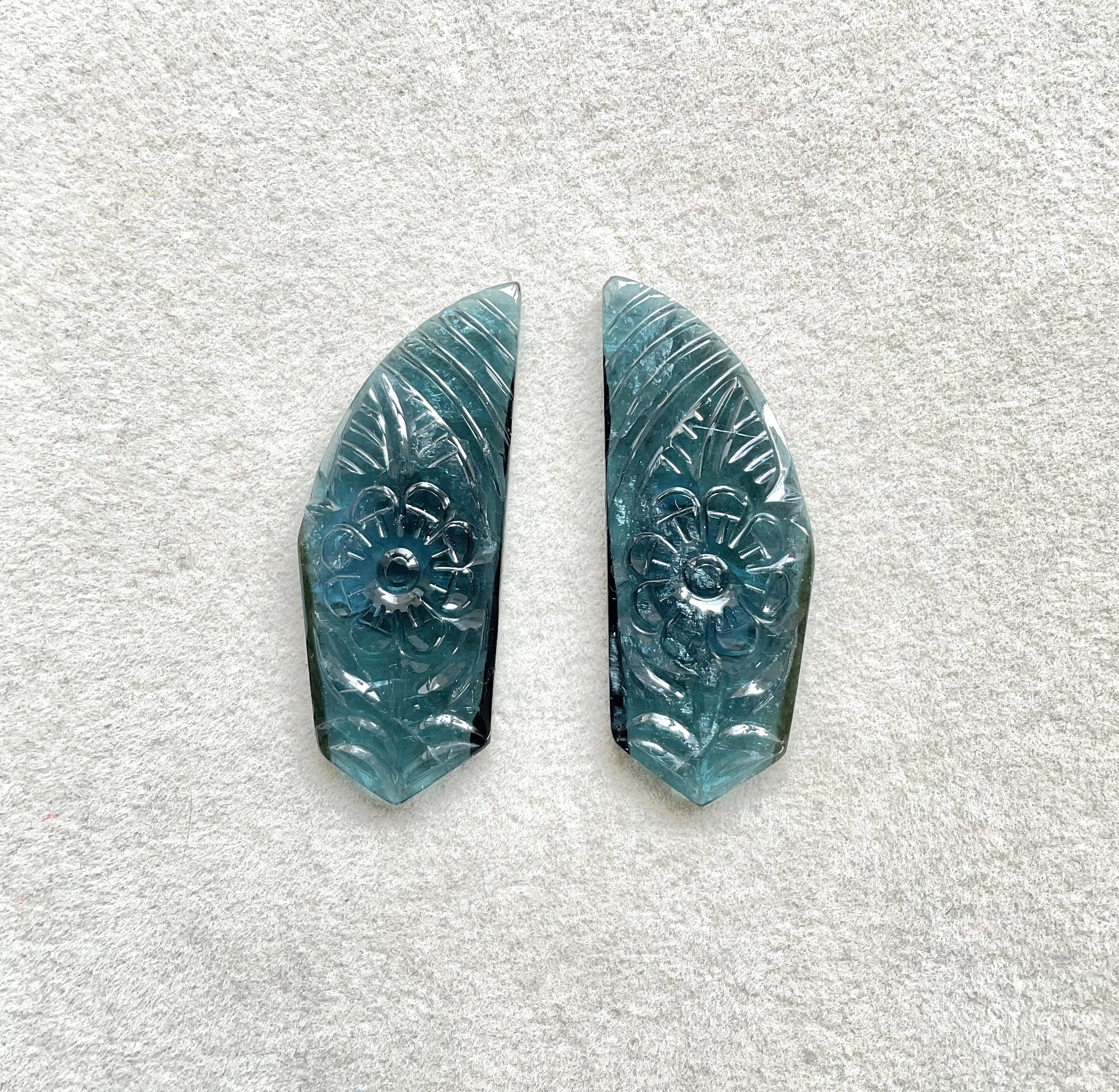 45.83 carats blue tourmaline carved pair top quality fine jewelry natural gem

Weight: 45.83 Carats
Size: 41x18x4 MM
Pieces: 2
Shape: Carved Leaf

