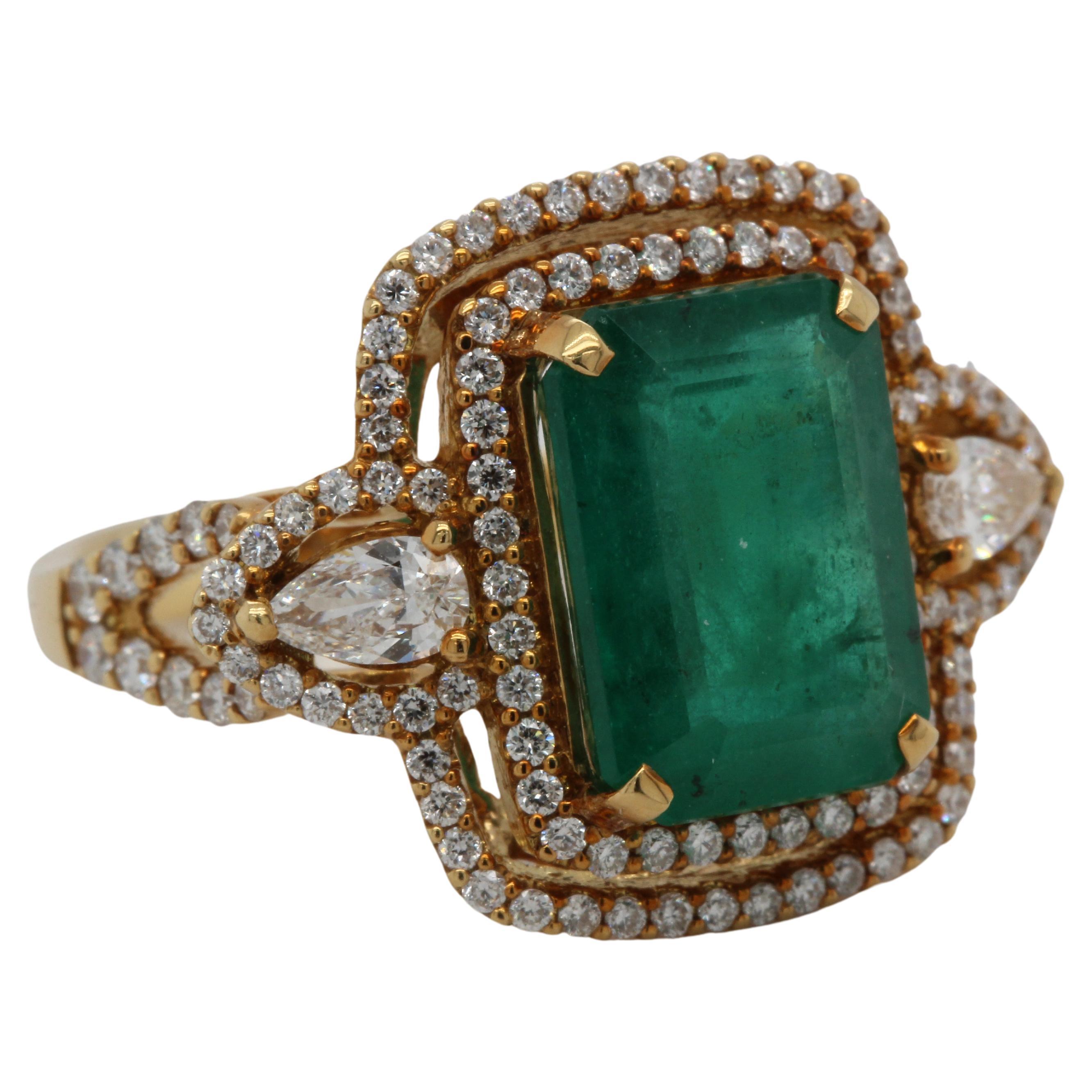 Emerald Cut 4.59 Carat Emerald And Diamond Ring In 18 Karat Gold For Sale