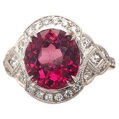 4.59 Carat Oval Cut Exotic Garnet and Diamond Ring in 18k White Gold