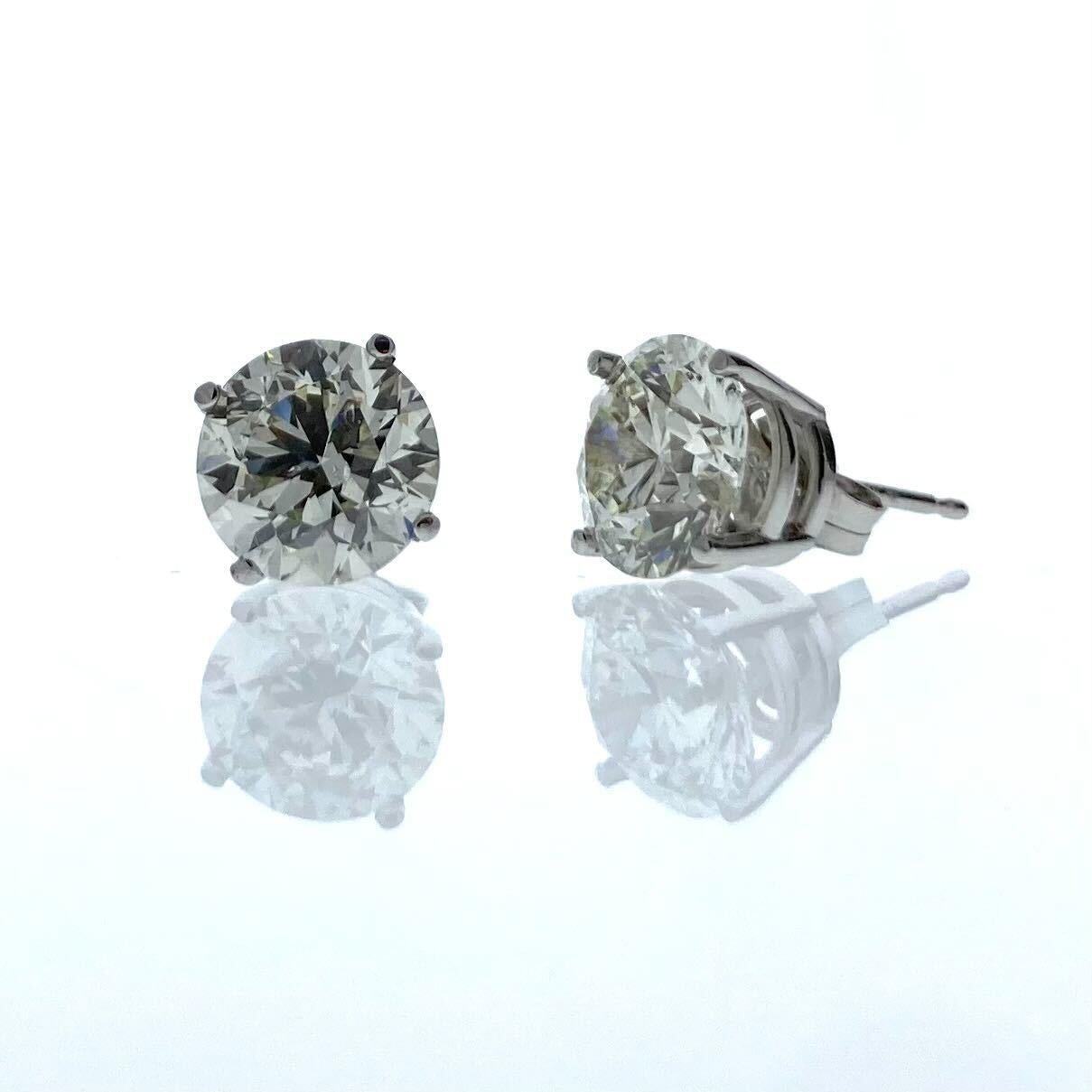 Round Cut 4.59 Total Carat Weight EGL Certified Round Diamond Studs In 14k White Gold For Sale