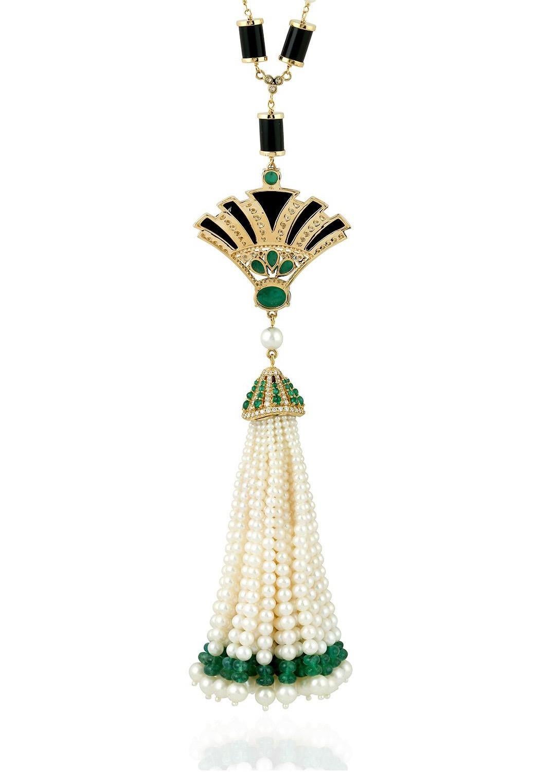 Una splendida collana di nappe art déco è realizzata a mano in oro 14 carati. È incastonato con 45,96 carati di smeraldo, 36,87 carati di onice e 2,25 carati di diamanti scintillanti. 

SEGUITE la vetrina di MEGHNA JEWELS per vedere le ultime