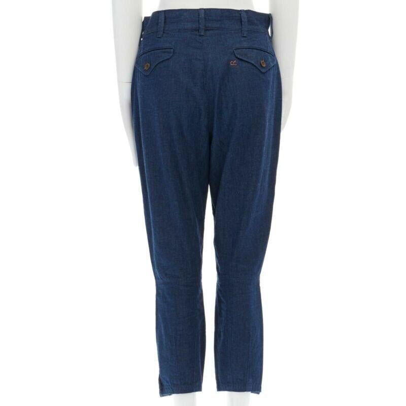 45R 45RPM natural dyed blue denim wood button cuff cropped capri jeans pants JP1
Reference: SANG/A00016
Brand: 45R
Material: Cotton
Color: Blue
Pattern: Solid
Closure: Zip
Extra Details: Indigo dyed cotton. Washed denim fabric. Belt loop detail.