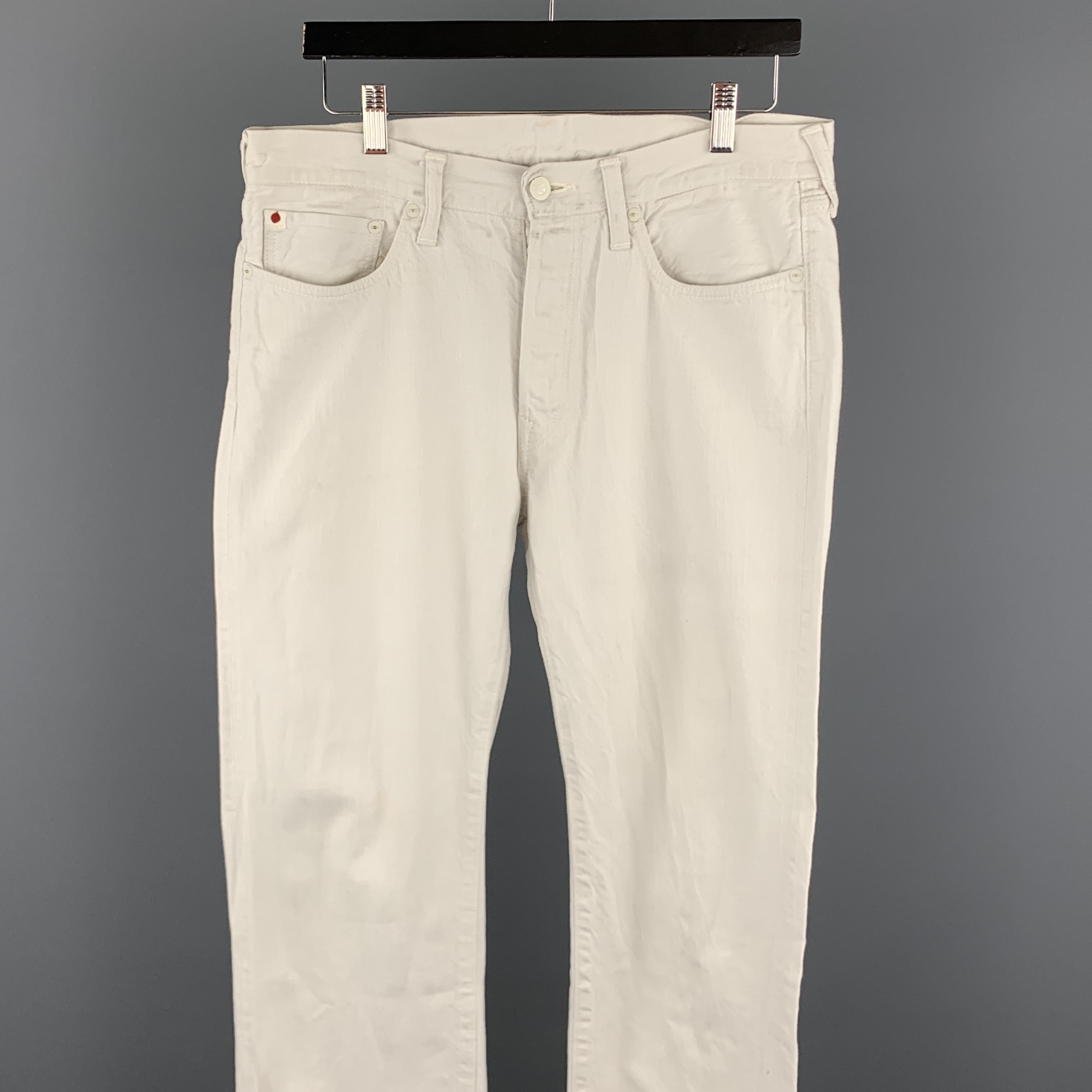 45RPM Jeans come in cream cotton selvedge denim with a button fly and tonal hardware. Made in Japan.

Excellent Pre-Owned Condition.
Marked: 32

Measurements:

Waist: 34 in.
Rise: 10.5 in.
Inseam: 36 in.
SKU: 100017
Category: Jeans

More