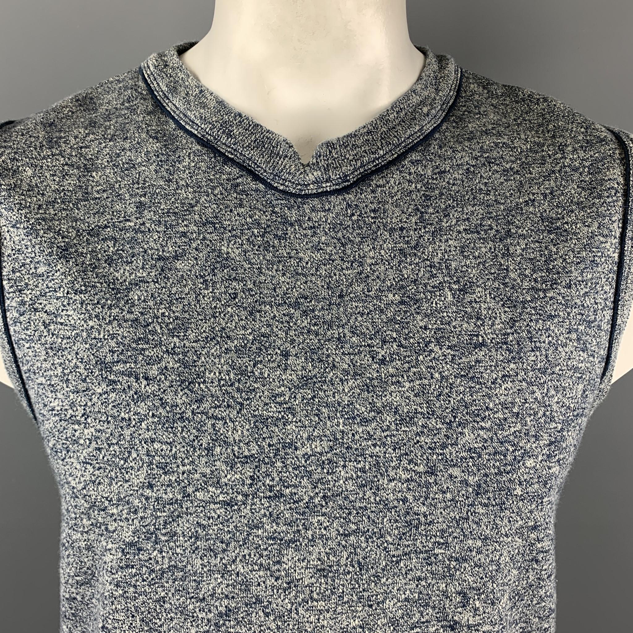 45RPM vest comes in gray and navy heathered cotton jersey knit with navy piping and a slit neckline detail. Made in Japan.

Excellent Pre-Owned Condition.
Marked: JP 5

Measurements:

Shoulder: 18 in.
Chest: 44 in.
Length: 27 in.
SKU: