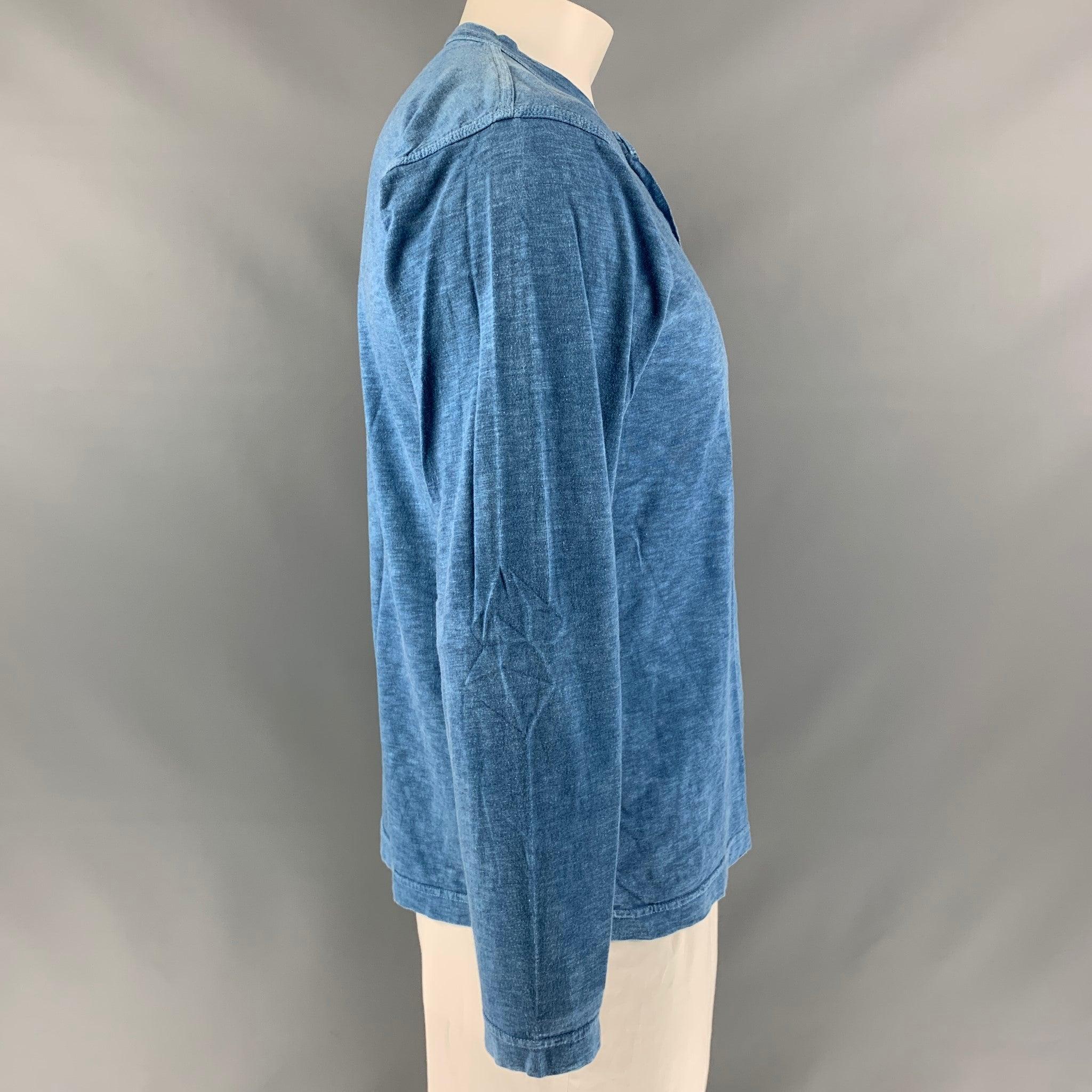 45rpm henley pullover comes in blue cotton jersey fabric. Made in Japan.Excellent Pre-Owned Condition.  
 

 Marked:  5 
 

 Measurements: 
  
 Shoulder: 19 inches Chest: 46 inches Sleeve: 22 inches Length: 26 inches  
 

  
  
  
 Sui Generis