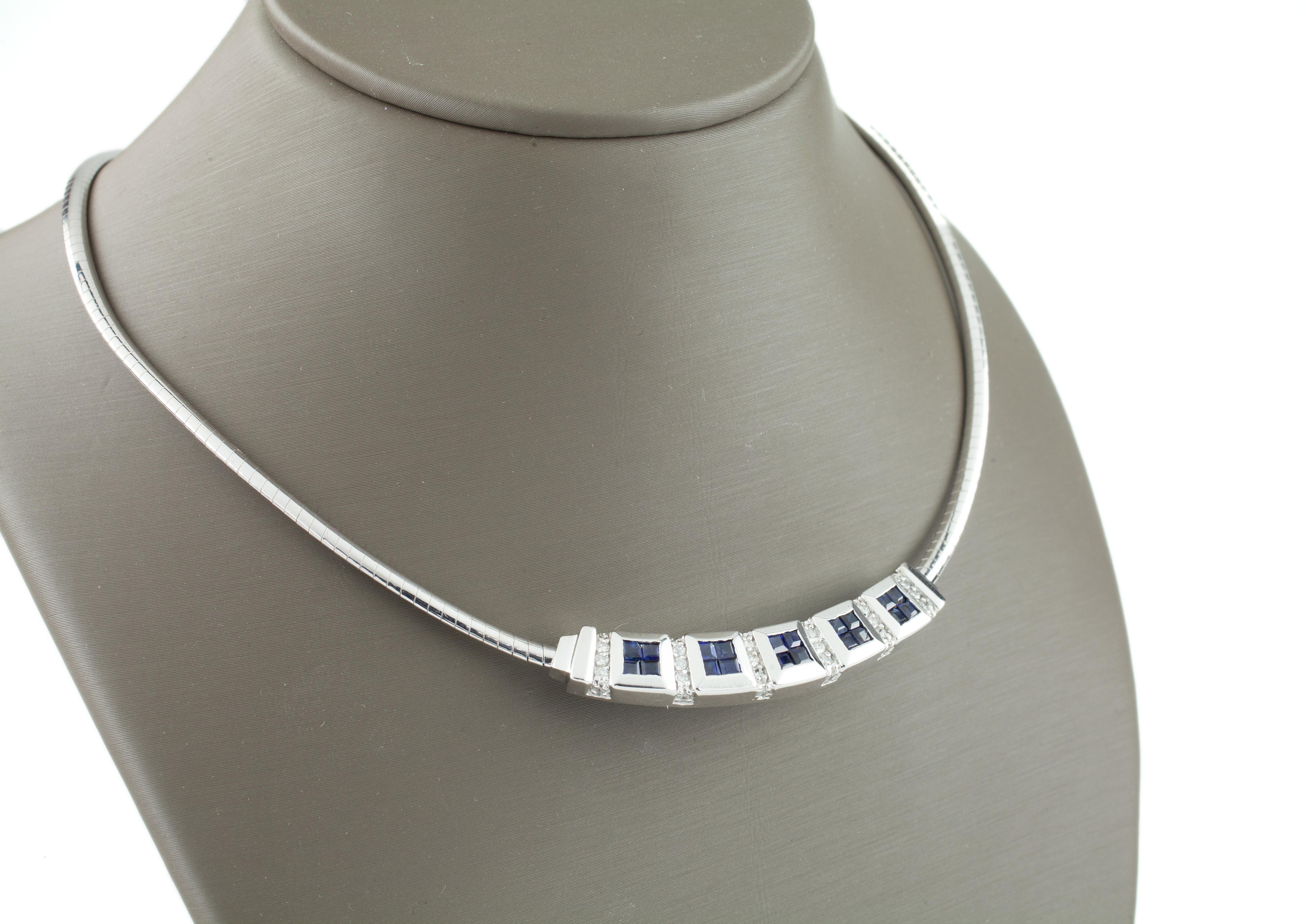 Gorgeous 14k White Gold Plaque Pendant Necklace
Plaque Features Five Stations each containing 4 princess-cut invisible set sapphires separated by a row of pave round diamonds
Total Sapphire Weight = Approximately 4 carats
Total Diamond Weight =