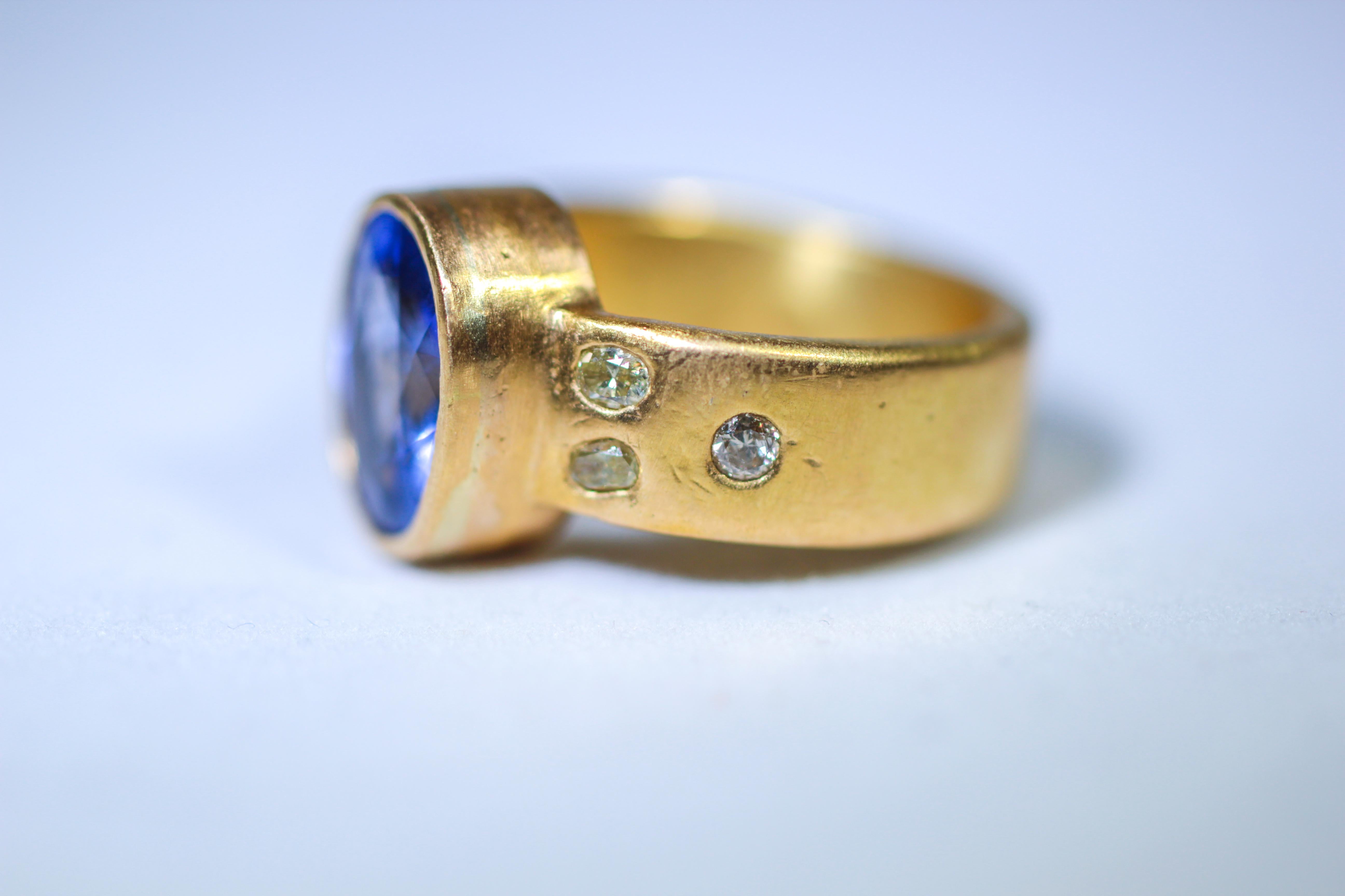 Oval Cut 4.6 Carat Tanzanite Solitaire Yellow Diamonds Handmade 22K-21K Gold Bridal Ring For Sale
