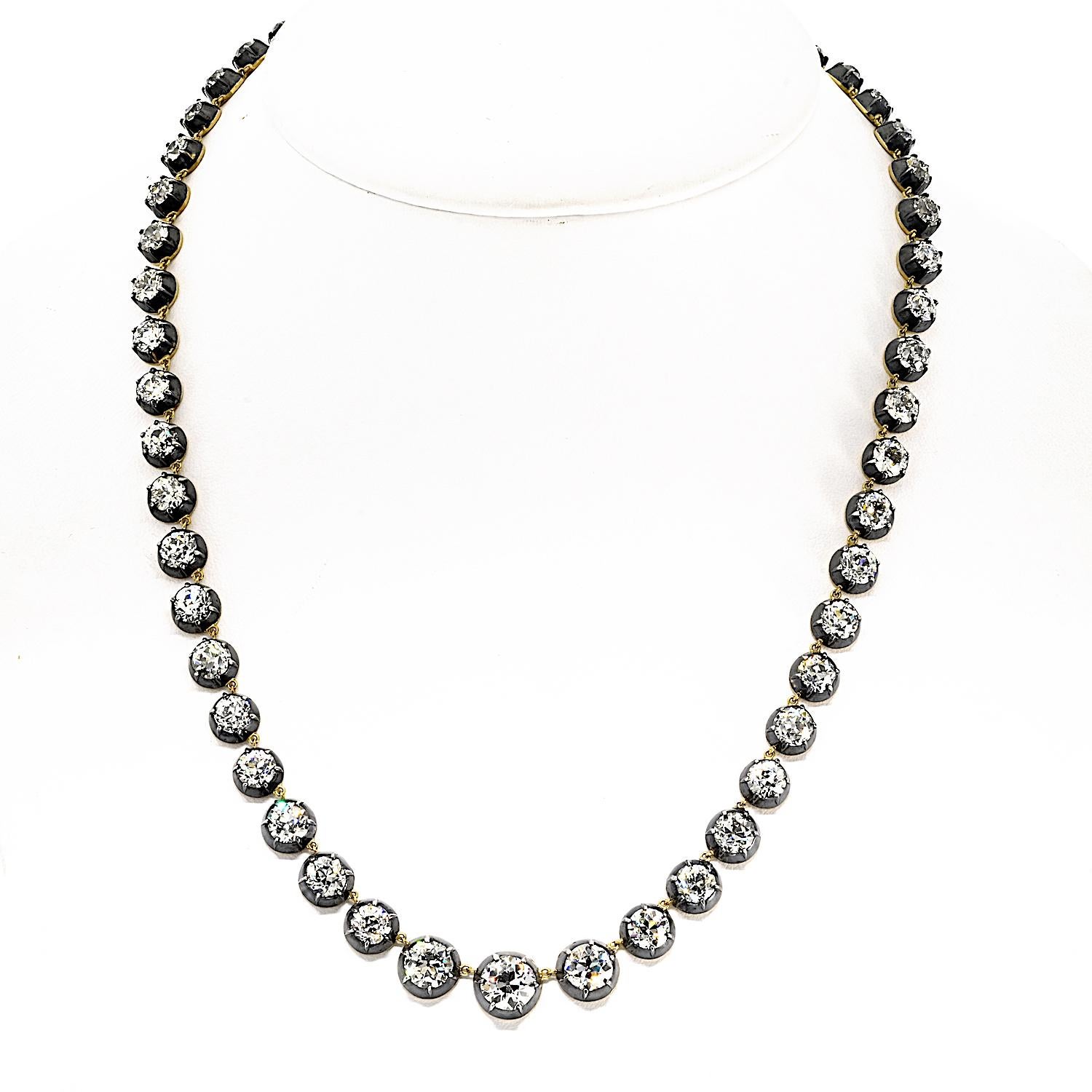 Inspired by the elegance of a bygone era, this antique-inspired necklace is a true masterpiece. Crafted in 18K yellow gold and silver, it showcases a breathtaking total of 46.15 carats of Old European cut diamonds. 

Featuring 53 exquisite diamonds,