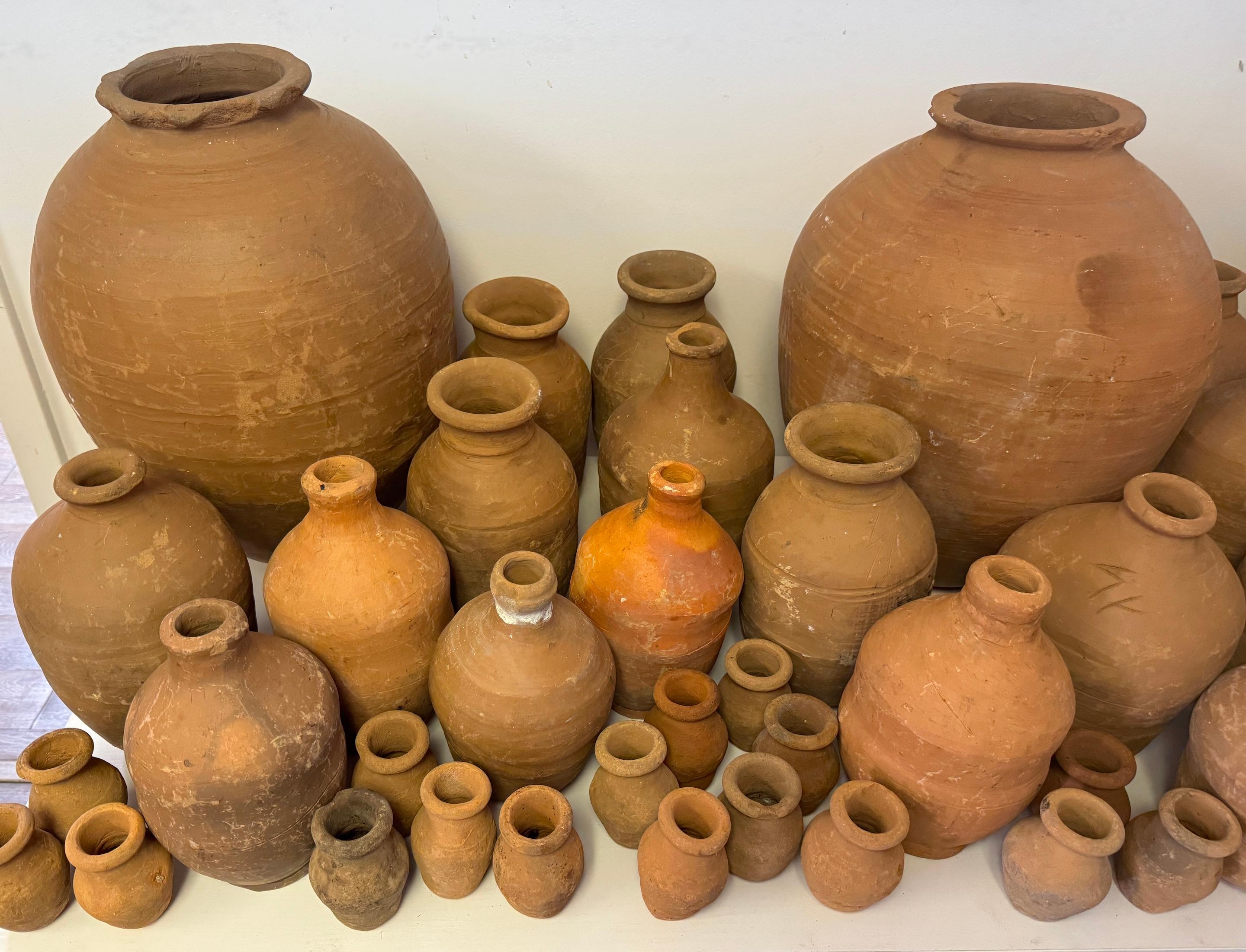 46 Piece Collection of 19th /20th C. Spanish Colonial Tinajas/ Vases In Distressed Condition For Sale In West Palm Beach, FL