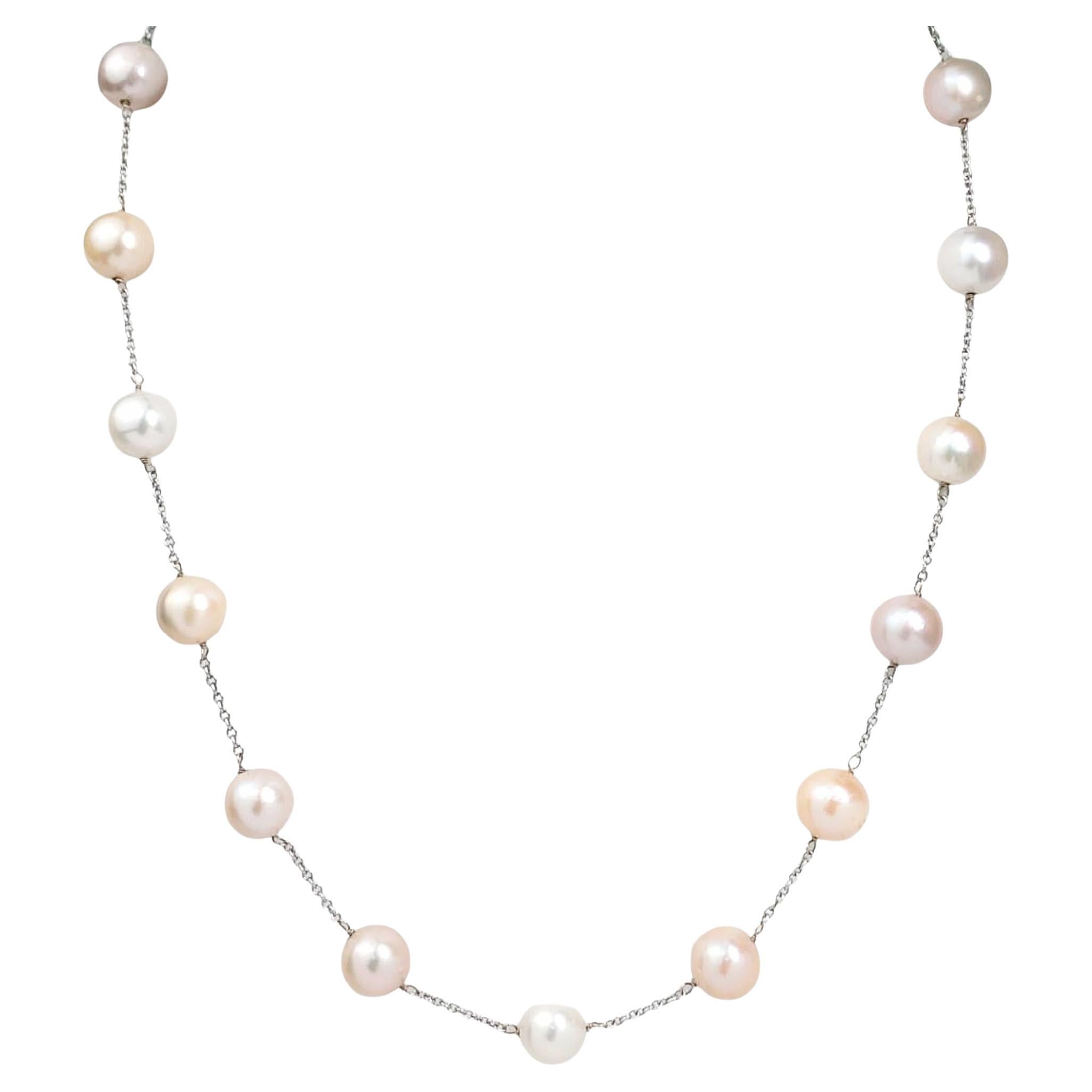 Vintage 46" Pink, Peach, and White Freshwater Pearl Necklace in 14K White Gold For Sale