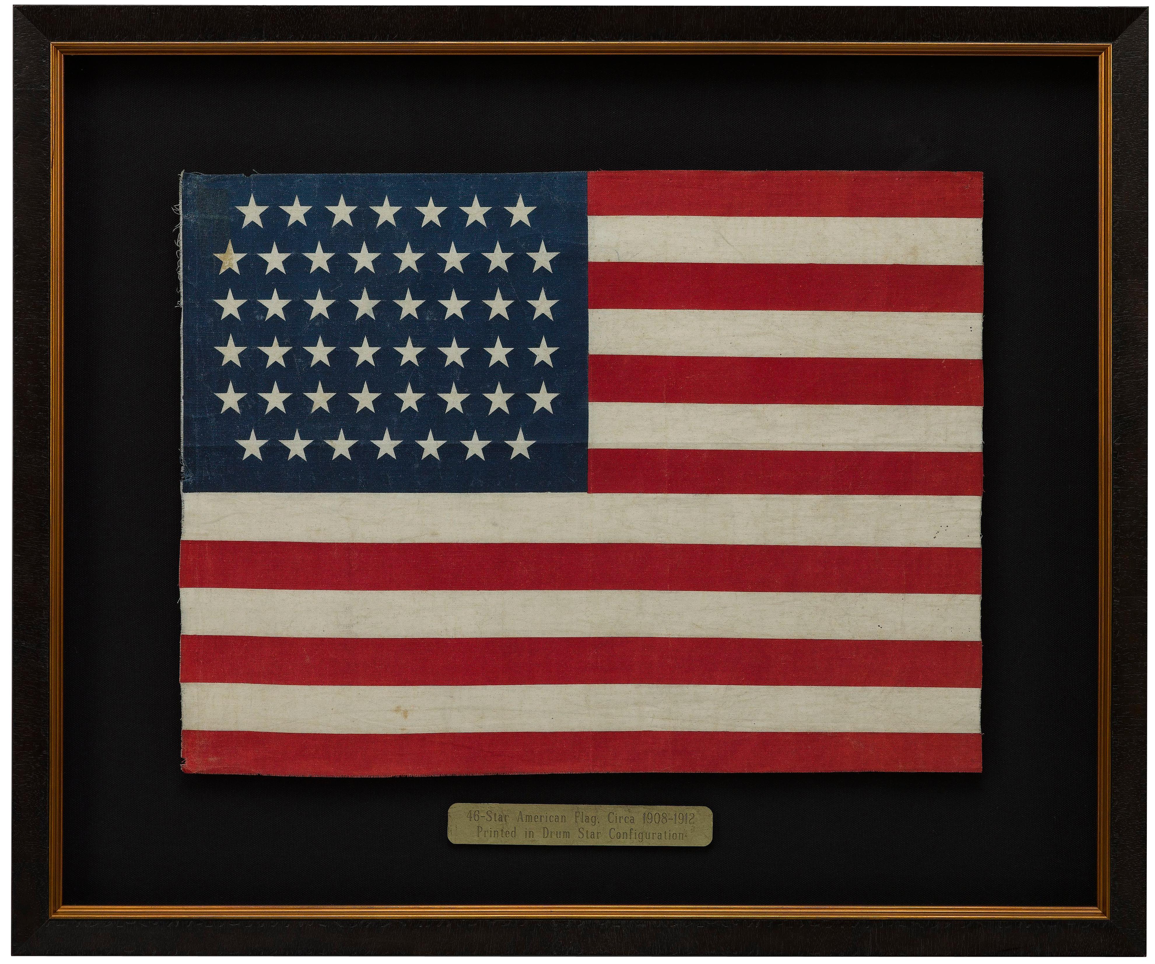 This is an original 46-Star American parade flag, celebrating Oklahoma statehood. Each star on the flag's canton represents a state in the Union at the time. The official flag design would update every July 4th, to include any new states added to