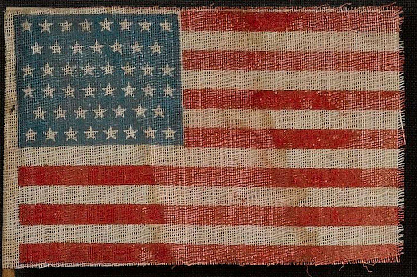 Early 20th Century 46-Star Printed American Flag Waver, Celebrating Oklahoma Statehood For Sale
