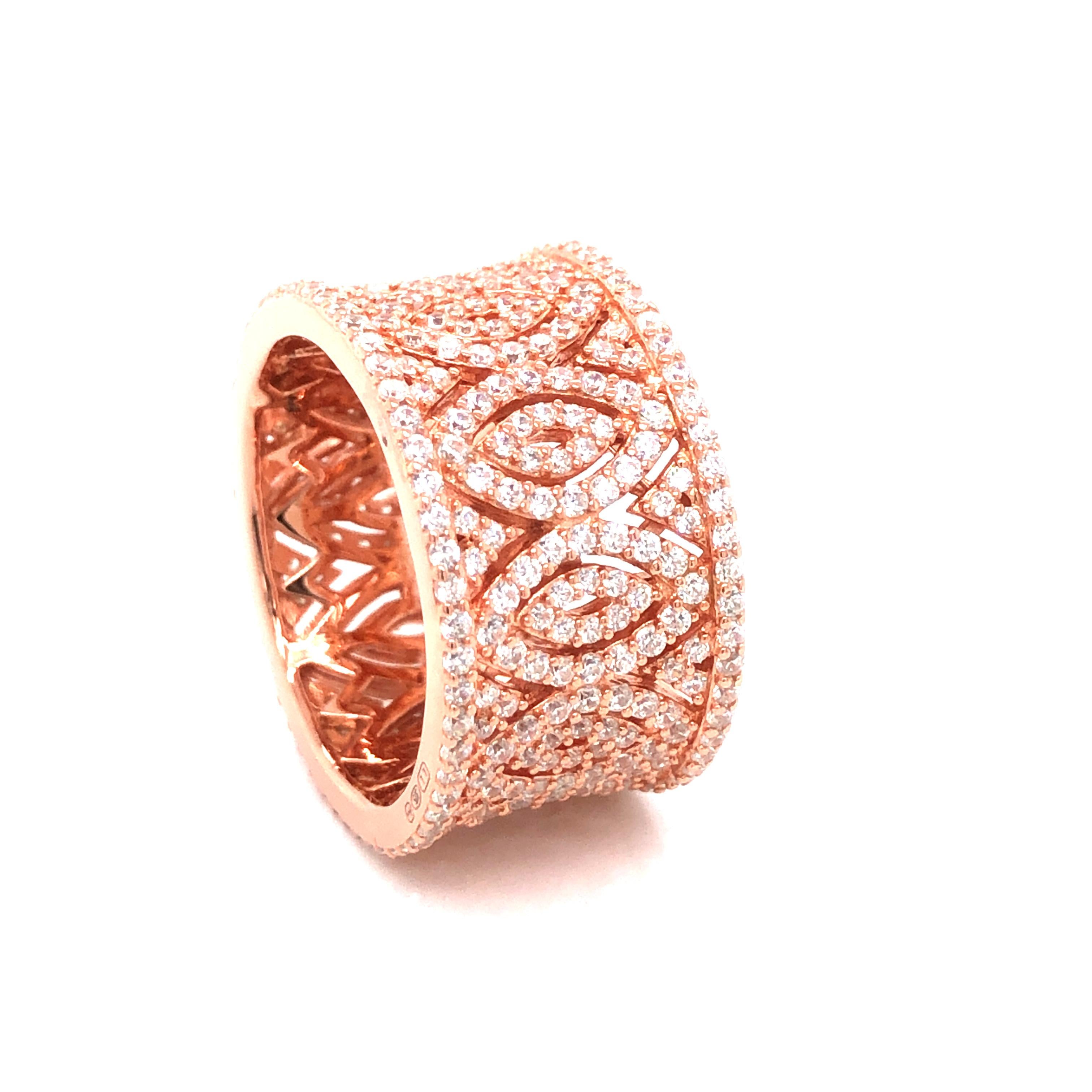Mixing femininity and contemporary design, this intricate ring is sumptuous and exciting. 

Featuring 3.40 carat of pave set round brilliant cut cubic zirconia. 

Composed of 925 sterling silver with either a 14ct rose gold, 14kt yellow gold or a