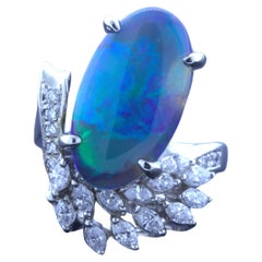Bague en platine avec opale noire australienne de 4.60 carats et diamants
