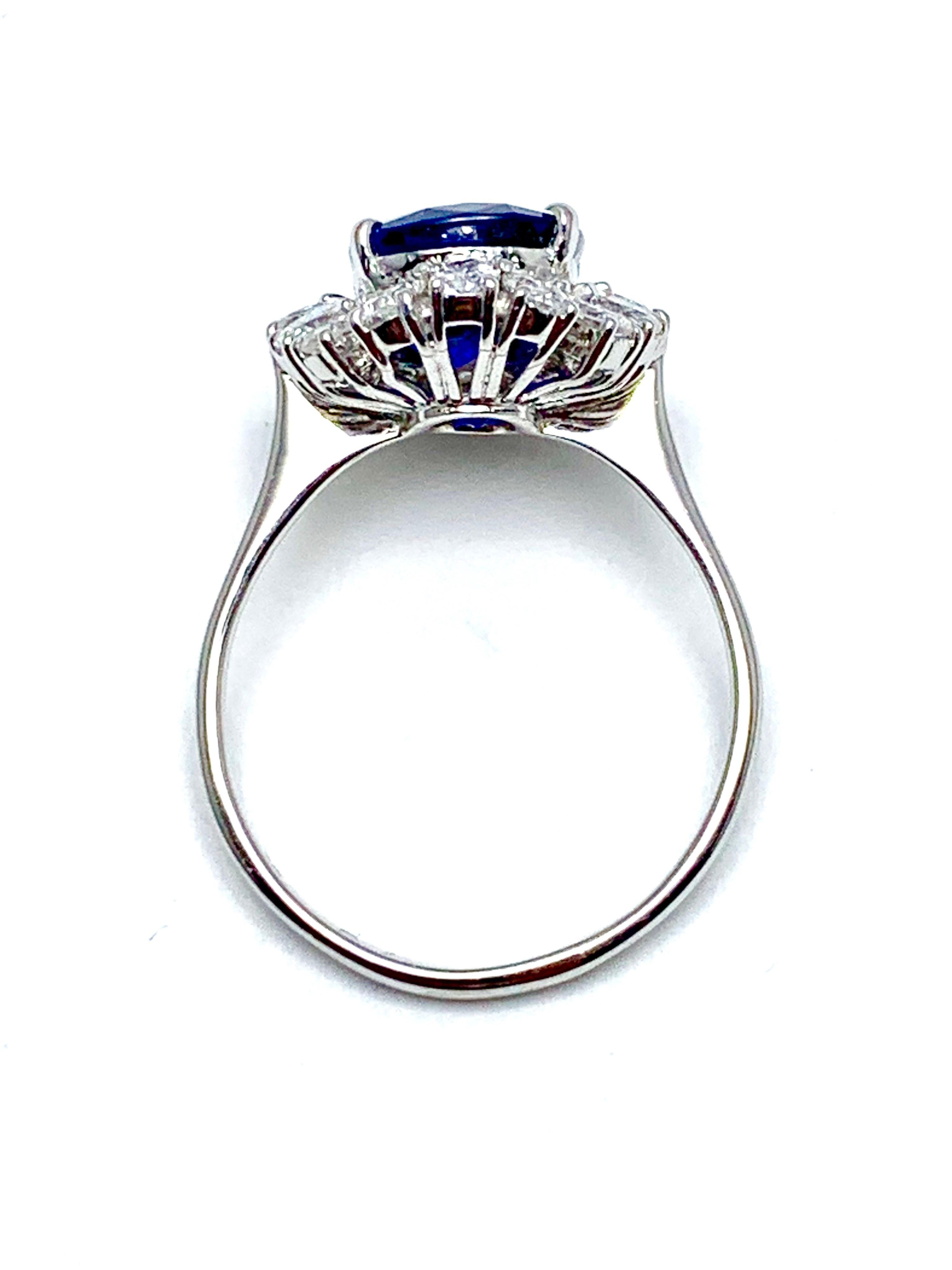 Women's or Men's 4.60 Carat Cushion Cut Sapphire and Oval Diamond Halo White Gold Cocktail Ring For Sale