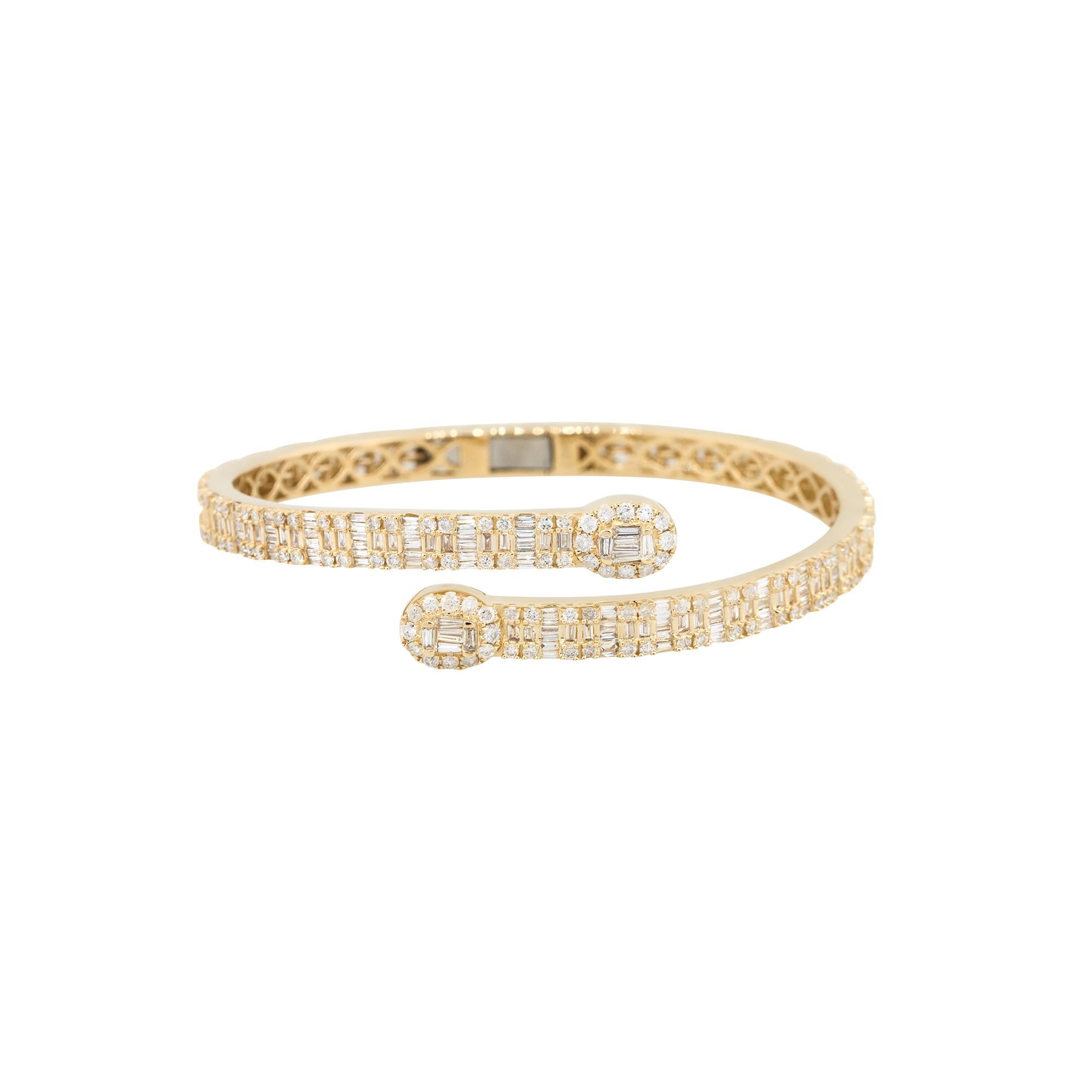 Material: 14k Yellow gold
Diamond Details: Approx. 8.75ctw of round and baguette cut Diamonds. Diamonds are G/H in color and VS in clarity
Measurements: 64mm x 14.5mm x 57mm
                           Will fit up to a 7