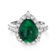 4.60 Carat Natural Emerald Cabochon and Diamond Halo Ring Made in Platinum