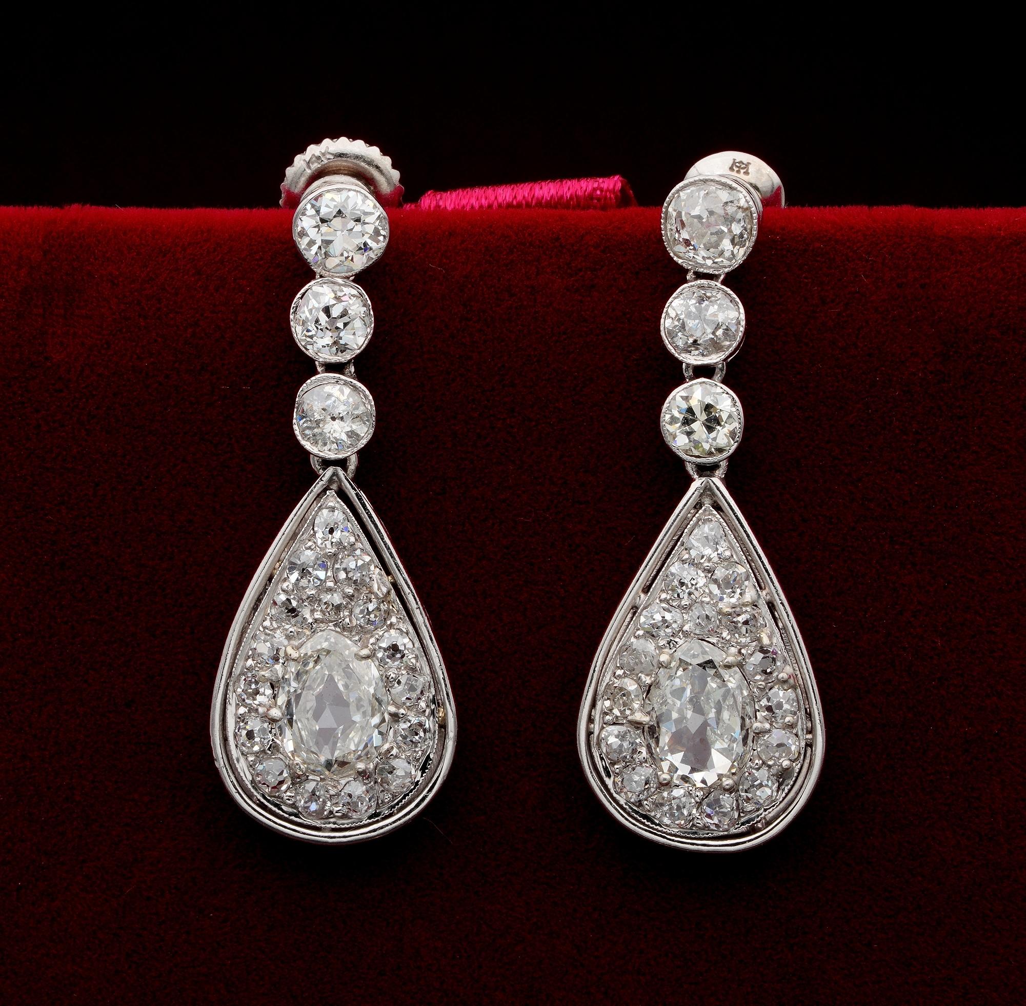 Authentic Edwardian platinum hand crafted classy shape Diamond drop earrings.
Sleek elegant design boasting 4.60 Ct Old mine cut Diamonds in total
The two maid pear  shaped Diamonds are old mine cut 1.50 Ct for both rated as G VVS for one G SI for