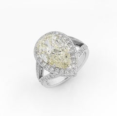 4.60 Carat Pear Shape Yellow Diamond Halo Engagement Ring