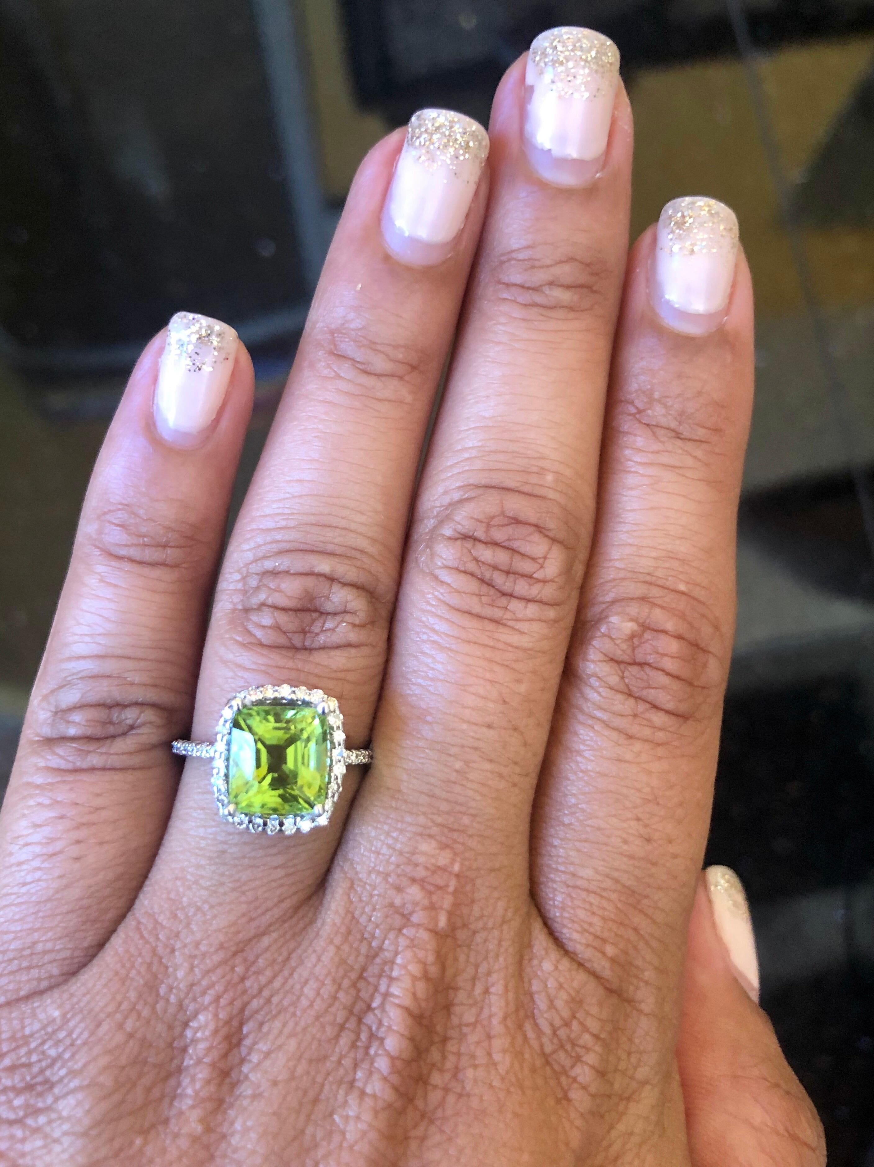 Modern Peridot Diamond White Gold Engagement Ring For Sale