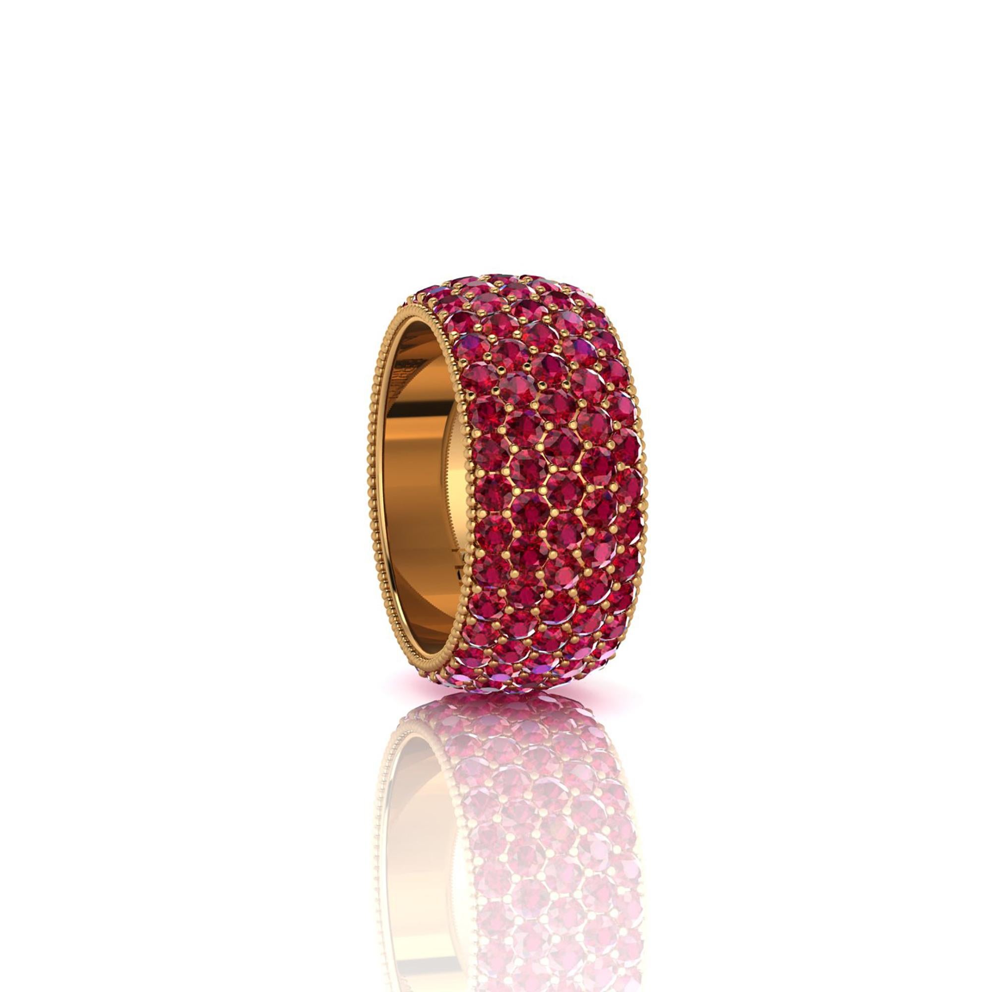 Wide red Ruby pave' ring, with a slightly dome feeling, a wrap of deep, bright red, for an approximate total carat weight of 4.60 carats, hand made in New York City with the best Italian craftsmanship, conceived in 18k yellow gold.
Classic,