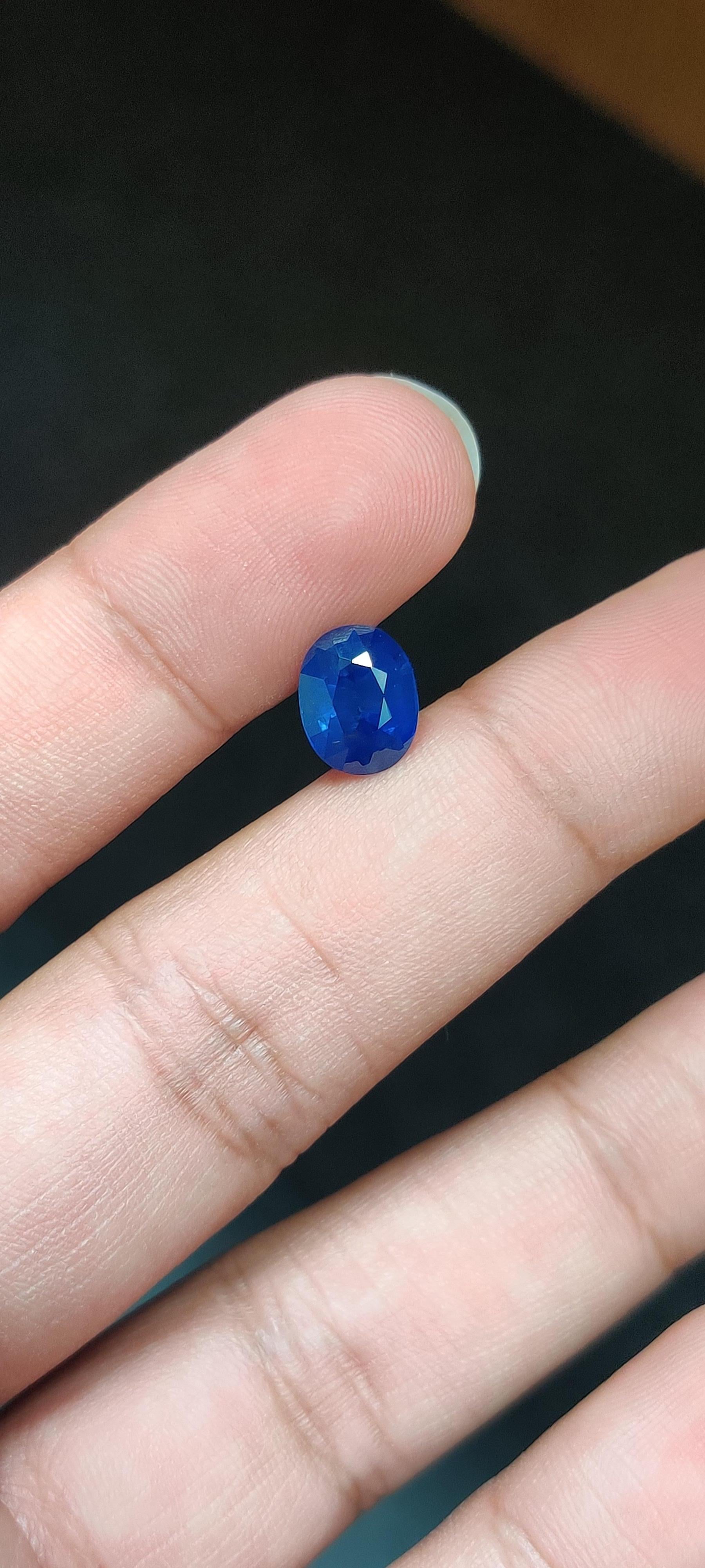 A 4.60 Carat Sapphire, resplendent in a royal blue hue. It hails from the enchanting gem mines of Sri Lanka. This exquisite gem has undergone standard heat treatment only, maintaining its 100% natural origin. The sapphire is cut to perfection in an