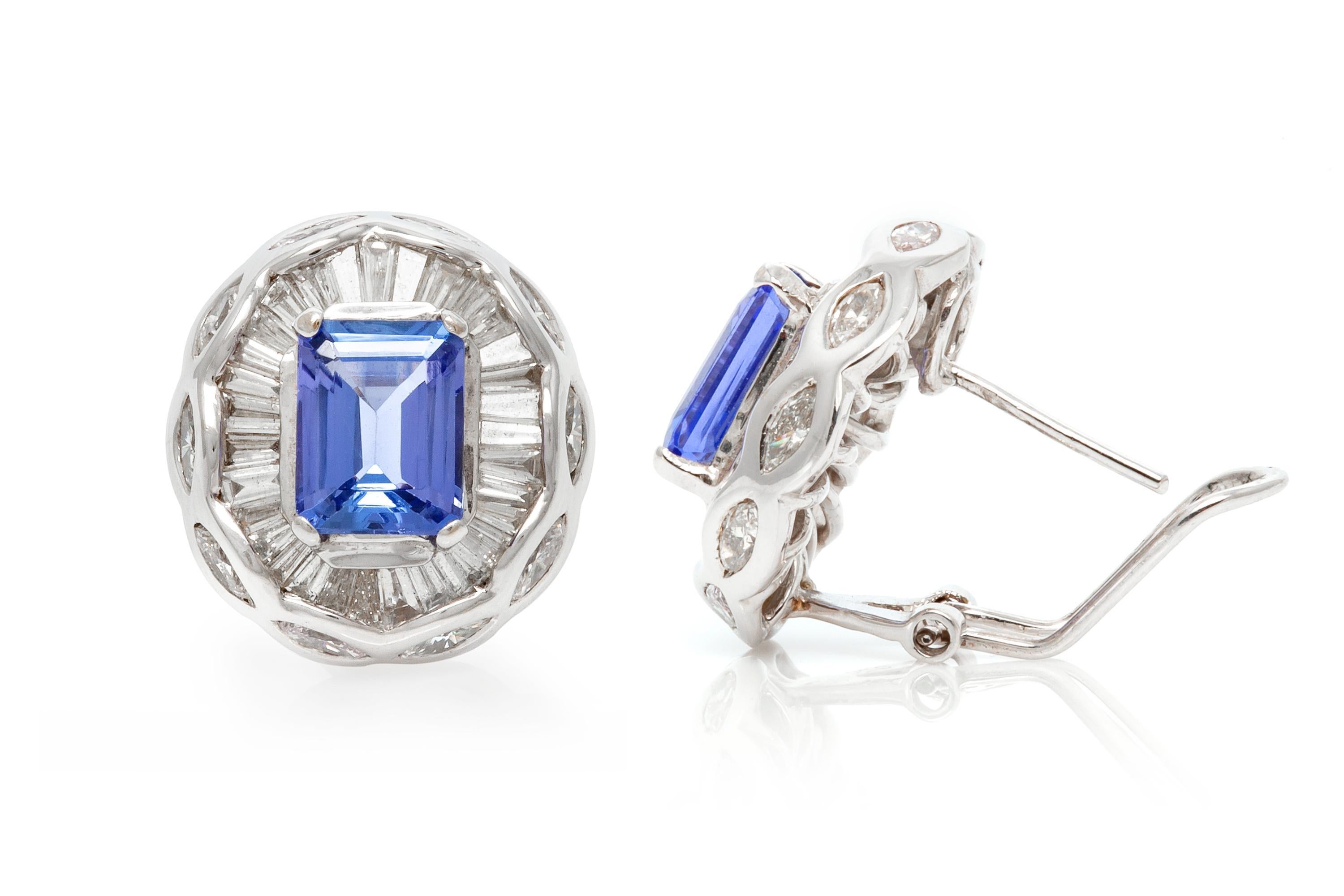 Finely crafted in 18k white gold with two Emerald cut Tanzanites weighing a total of approximately 4.60 carats, accented by Baguette and Marquise cut Diamonds weighing a total of approximately 4.11 carats.
3/4 x 11/16 inches