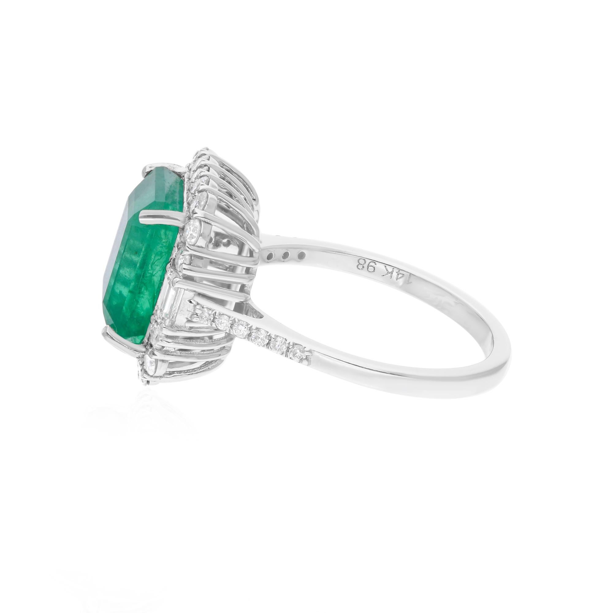 Cast from 14-karat gold, these exquisite ring is handset with 4.60 carats Zambian emerald and 0.78 carats of sparkling diamonds.

The ring is a size 7 US and may be resized to larger or smaller upon request. FOLLOW SPECTRUM JEWELS storefront to view