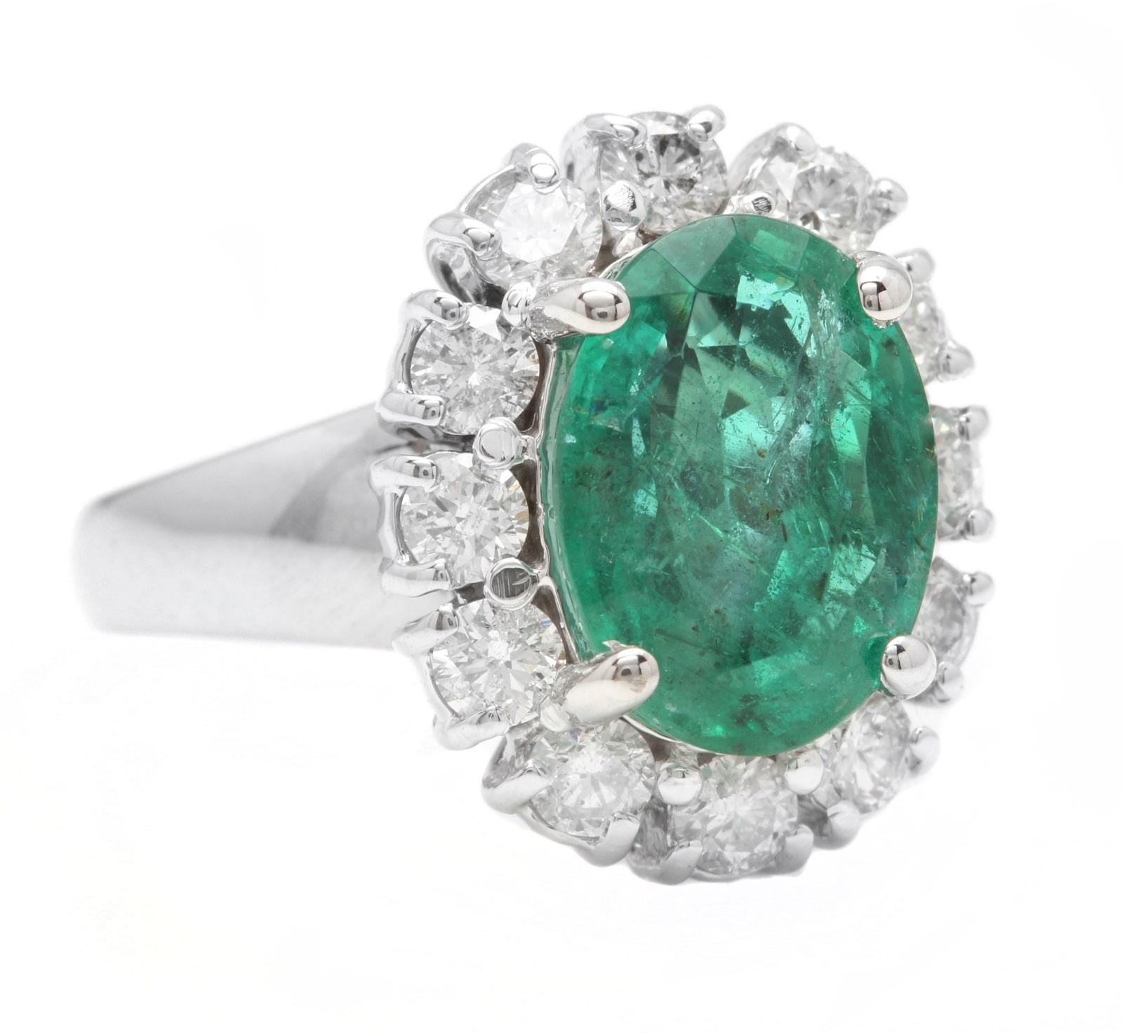 4.60 Carats Natural Emerald and Diamond 14K Solid White Gold Ring

Suggested Replacement Value: $7,800.00

Total Natural Green Emerald Weight is: Approx. 3.50 Carats (transparent)

Emerald Treatment: Oiling  

Emerald Measures: 11 x 9mm

Natural
