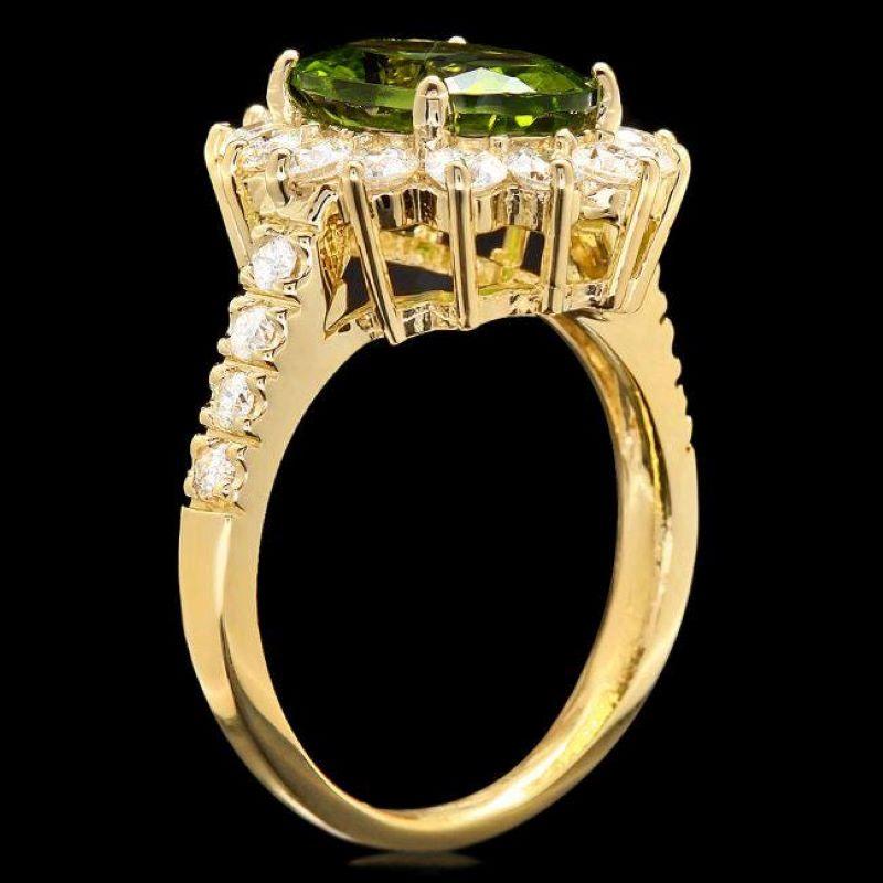 4.60 Carats Natural Peridot and Diamond 14K Solid Yellow Gold Ring

Total Natural Oval Peridot Weight is: Approx. 3.40 Carats 

Peridot Measures: Approx. 11.00 x 9.00mm
 
Natural Round Diamonds Weight: Approx. 1.20 Carats (color G-H / Clarity