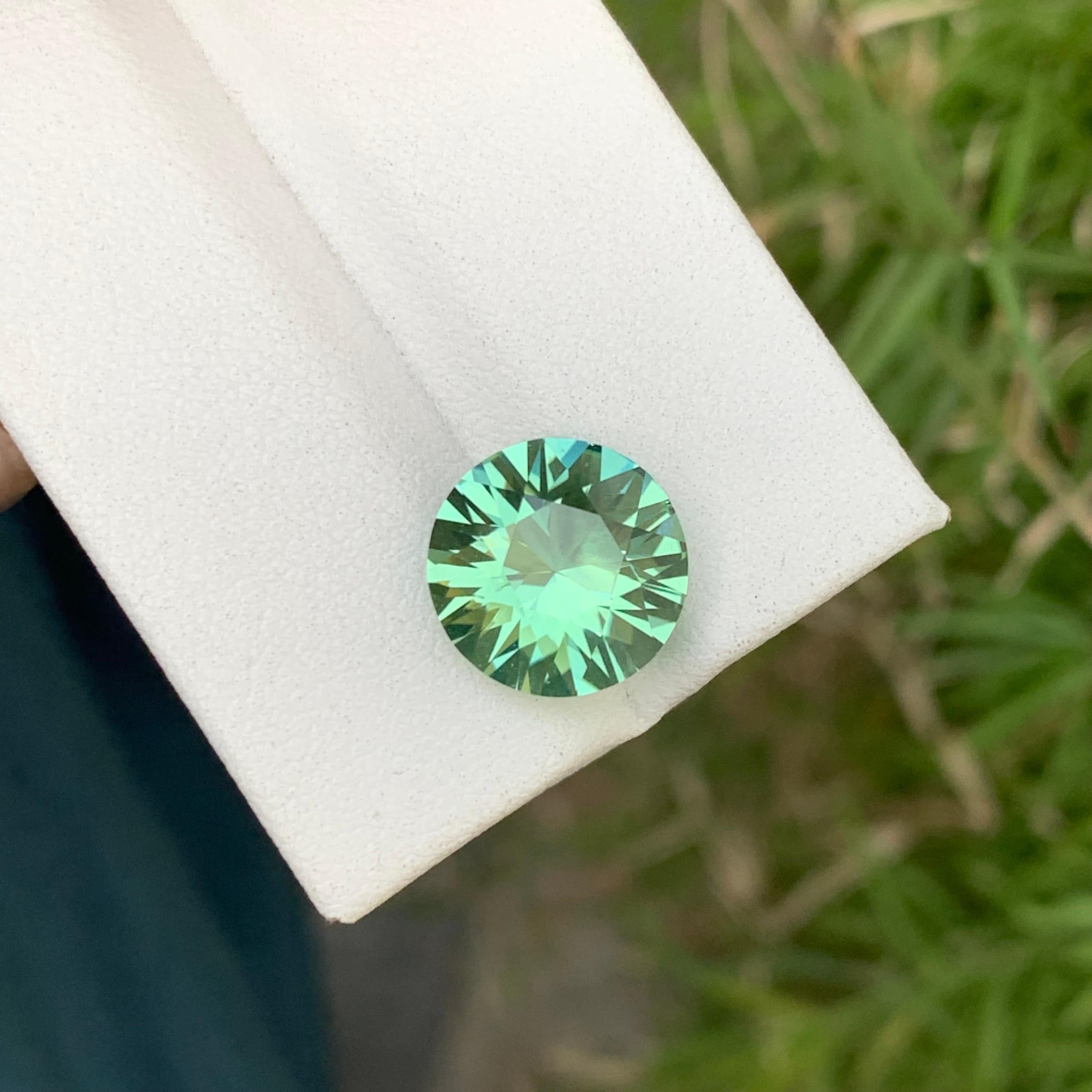 Loose Tourmaline 
Weight: 4.60 Carats 
Dimension: 11.2x11.2x6.7 Mm
Origin: Kunar Afghanistan 
Shape: Round 
Treatment: Non
Color: Mint Green
Certificate: On Customer Demand 
Mint green tourmaline is a captivating variation of tourmaline, celebrated