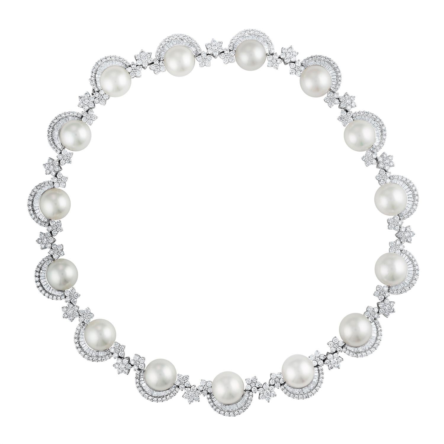 Stunning 3-Piece Set
The set consists of 1 Bracelet, 1 Necklace, & 1 Pair of Earrings

The necklace is 18K White Gold
There are 27.85 Carats in Diamonds F/G VS/SI
There are 15 South Sea Pearls 13mm Each
The necklace is 18