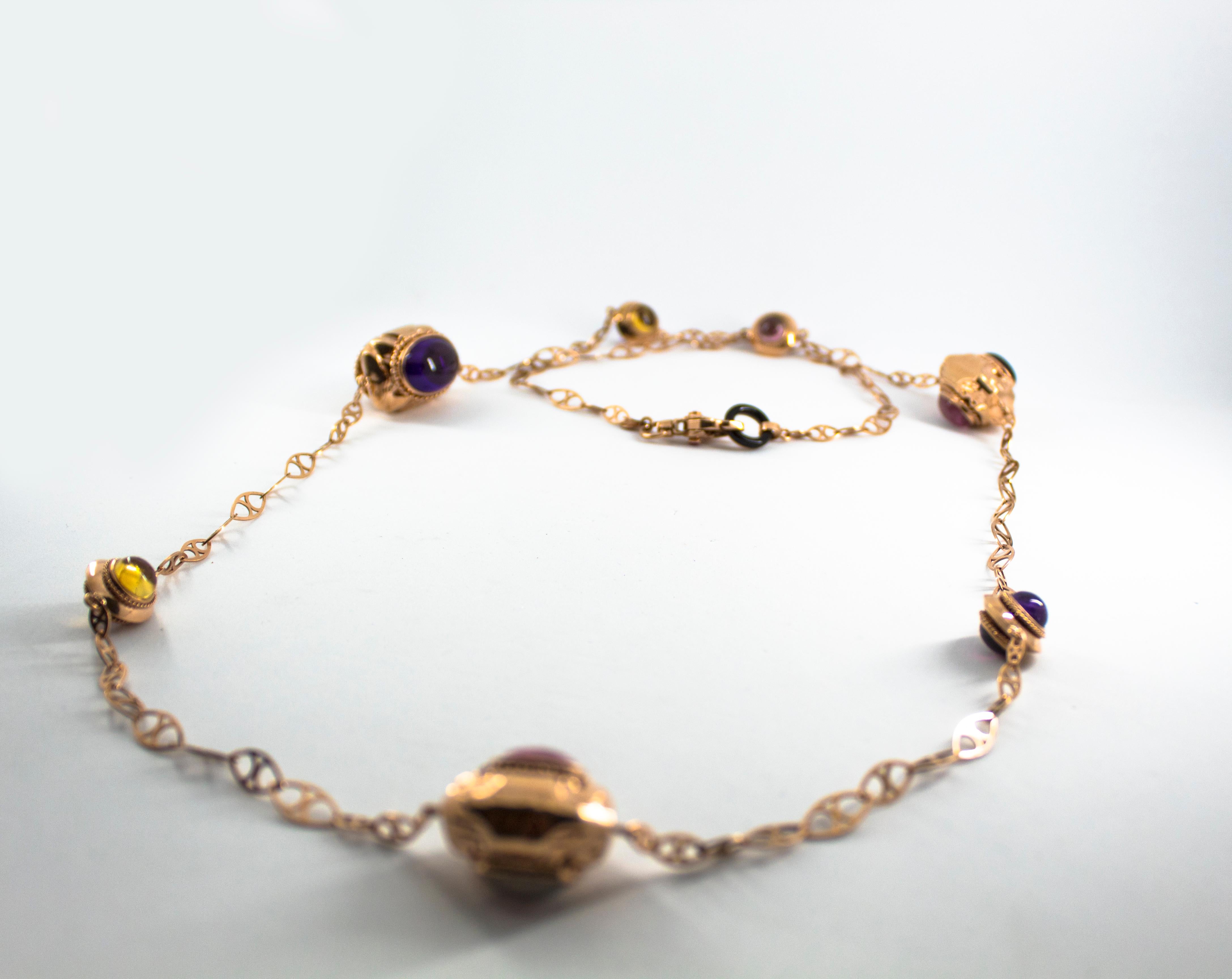Diese Halskette ist aus 14K Gelbgold gefertigt.
Diese Halskette besteht aus 0,35 Karat Rubinen.
Diese Halskette hat 21,00 Karat Turmalin.
Diese Halskette hat 12,00 Karat Amethyst.
Diese Halskette hat 13,00 Karat Citrin.
Diese Halskette hat auch