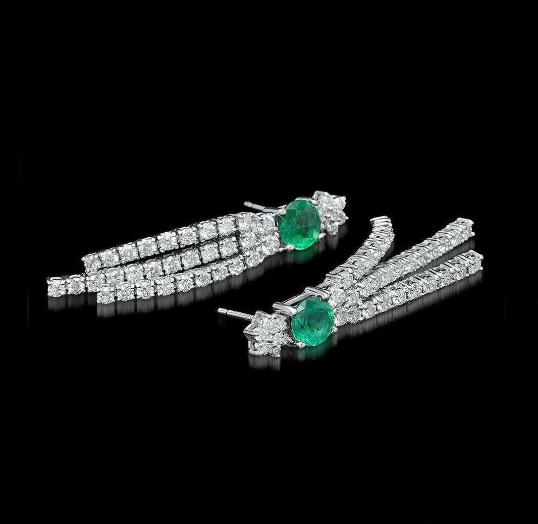 Exquisite 4.60 Carats Natural Emerald and Diamond 14K Solid White Gold Earrings

Amazing looking piece!

Total Natural Round Cut White Diamonds Weight: Approx. 2.60 Carats (color G-H / Clarity SI1-SI2)

Total Natural Round Cut Emeralds Weight: