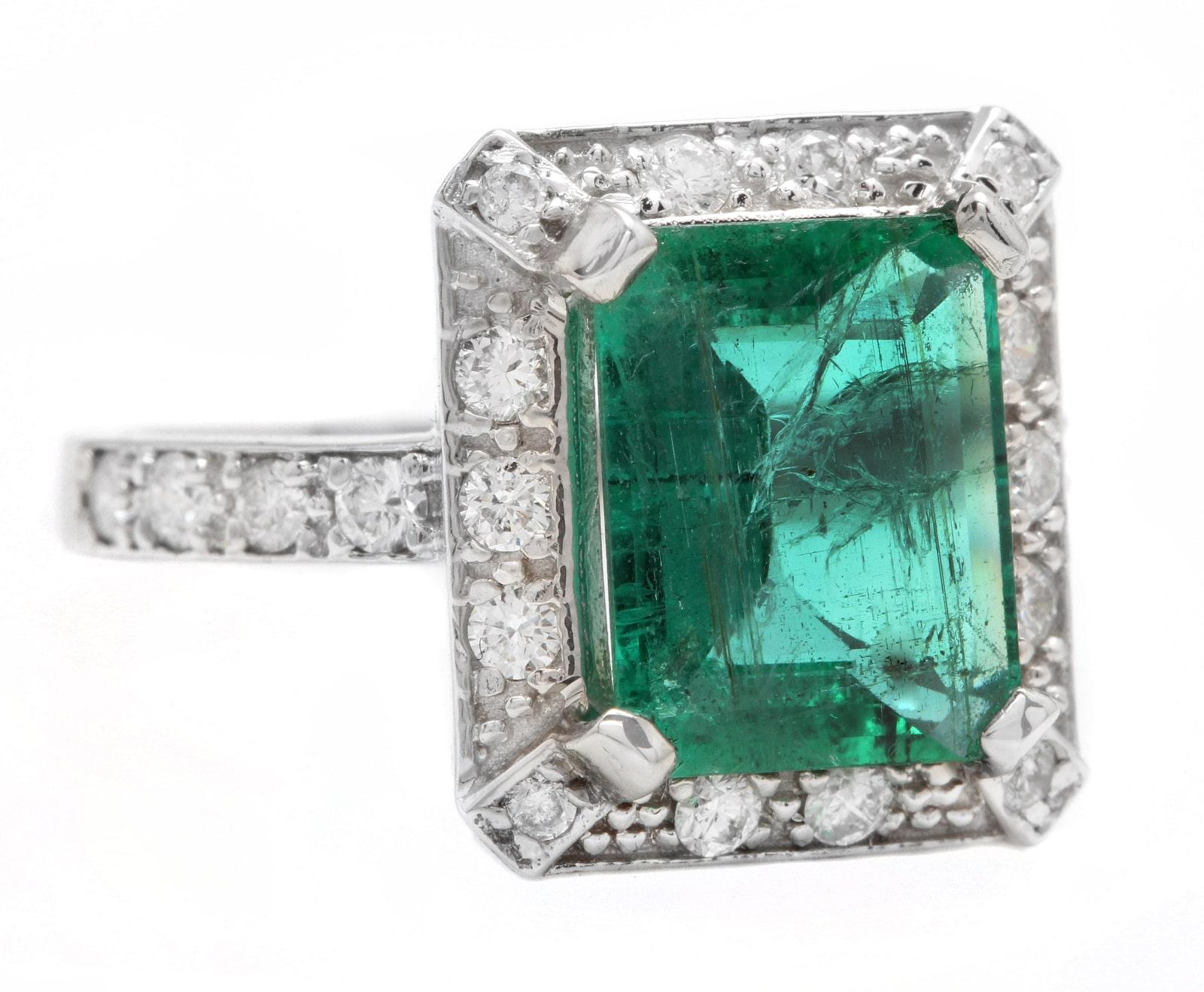 4.60 Carats Natural Emerald and Diamond 14K Solid White Gold Ring

Suggested Replacement Value: Approx. $6,000.00

Total Natural Green Emerald Weight is: Approx. 4.00 Carats (transparent)

Emerald Measures: Approx. 11 x 9mm

Emerald Treatment:
