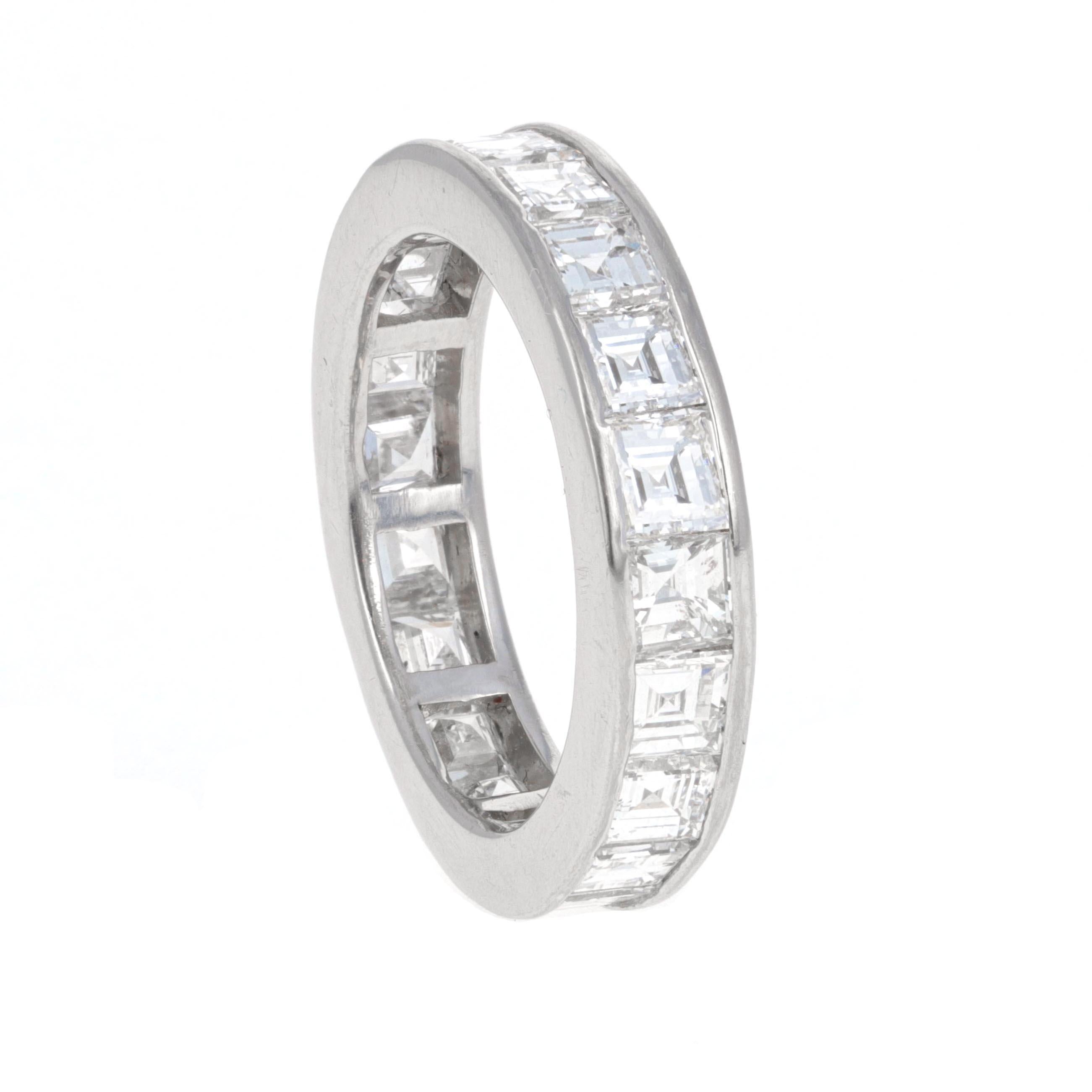 Platinum asscher cut diamond eternity band. Each diamond is white in color and eye clean. The diamonds are channel set and match perfectly in size. This is a perect engagement ring and/ or band that can be worn by a man or woman.
There is a total of